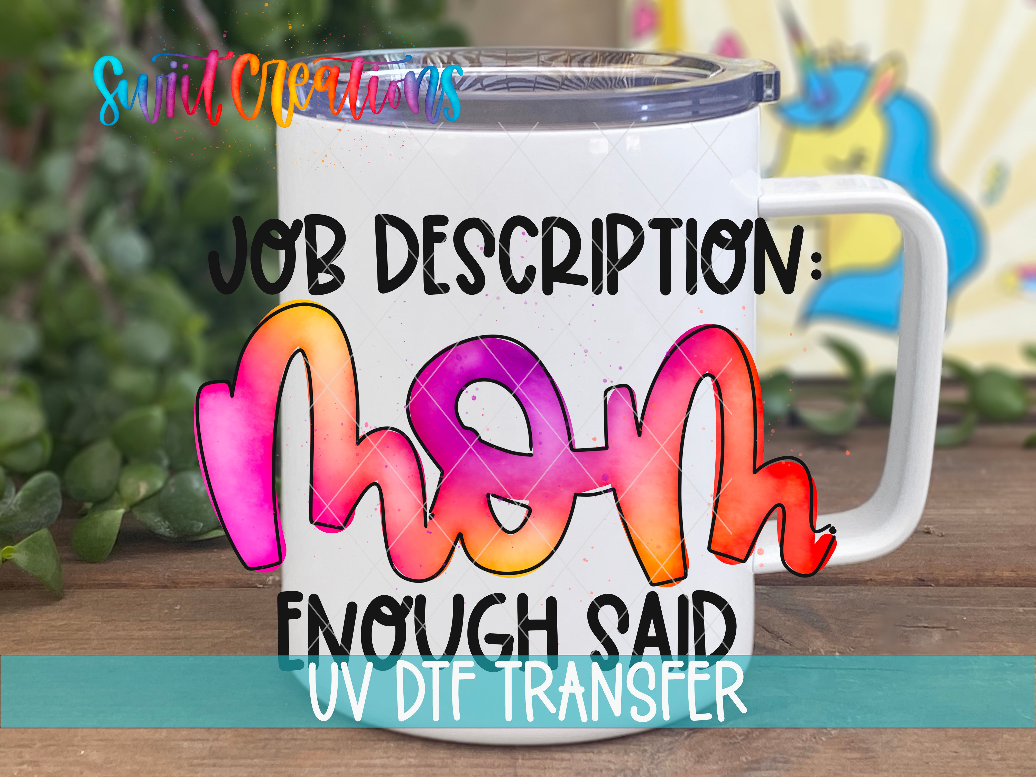 A white mug with colorful text that says "JOB DESCRIPTION: Mom ENOUGH SAID UV DDF TRANSFER" on it.