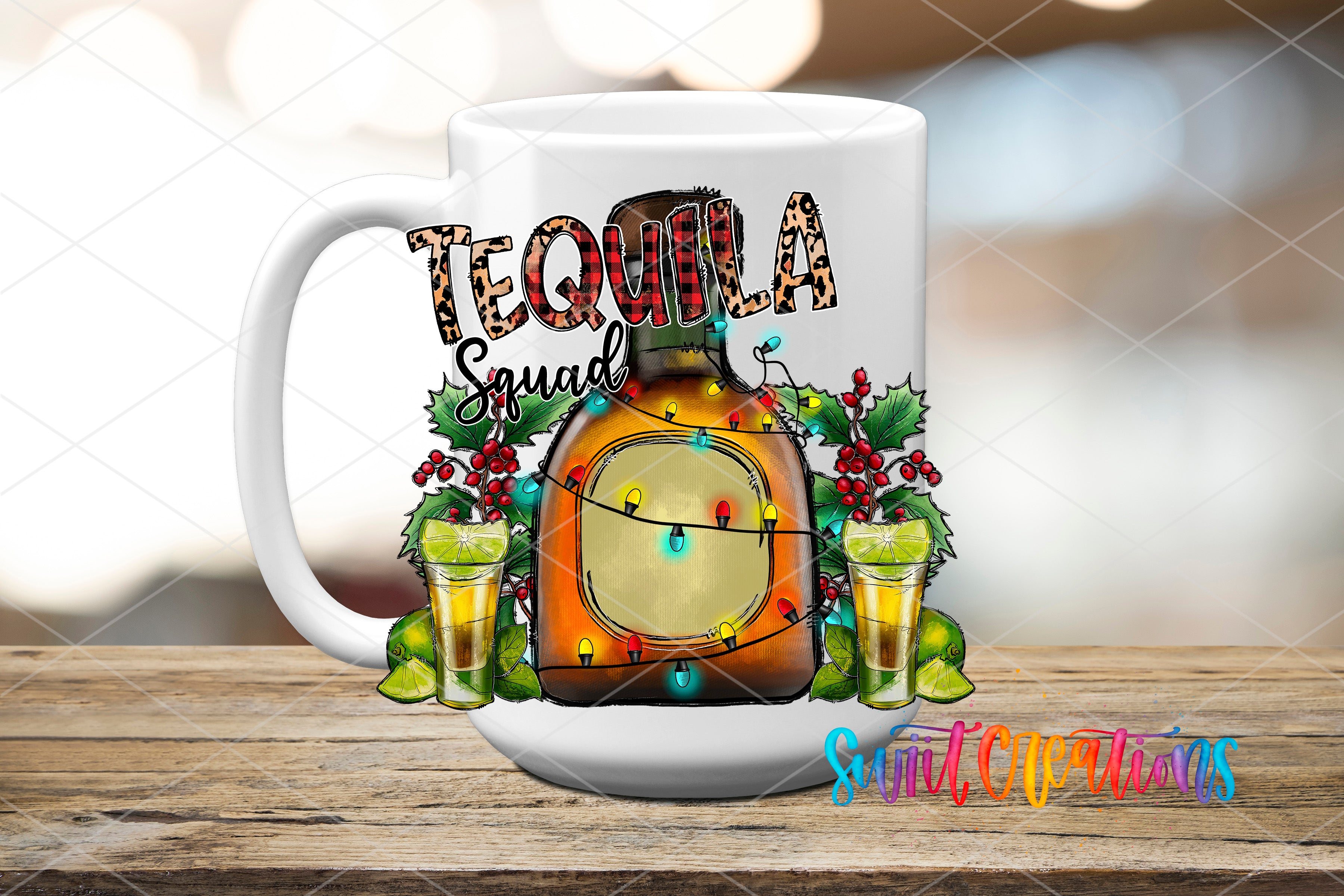 A white mug with a colorful design featuring a bottle of tequila, a glass of lime, and Christmas lights.