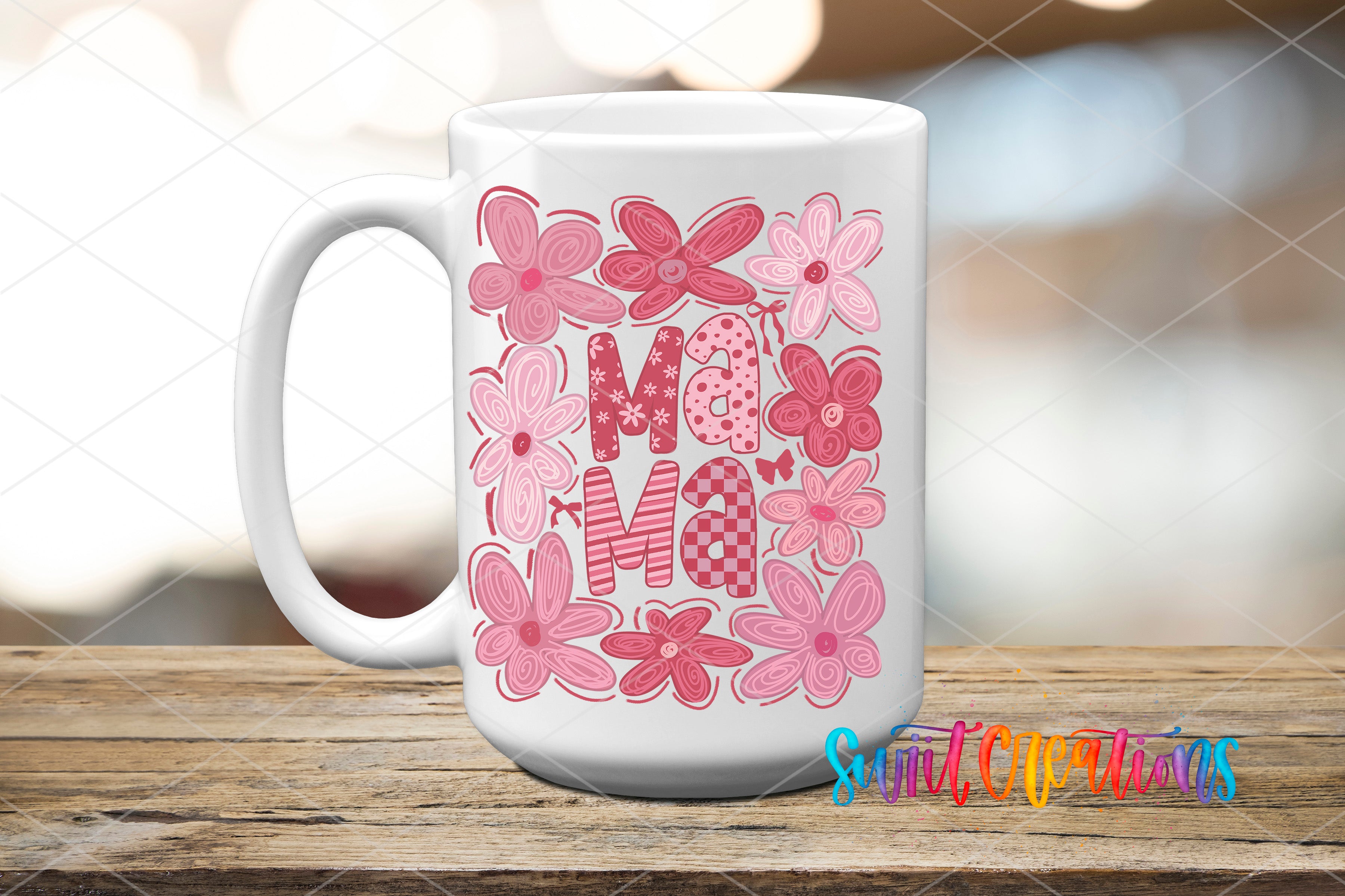 A white ceramic mug with a floral design and the word "Mama" written on it, placed on a wooden surface.