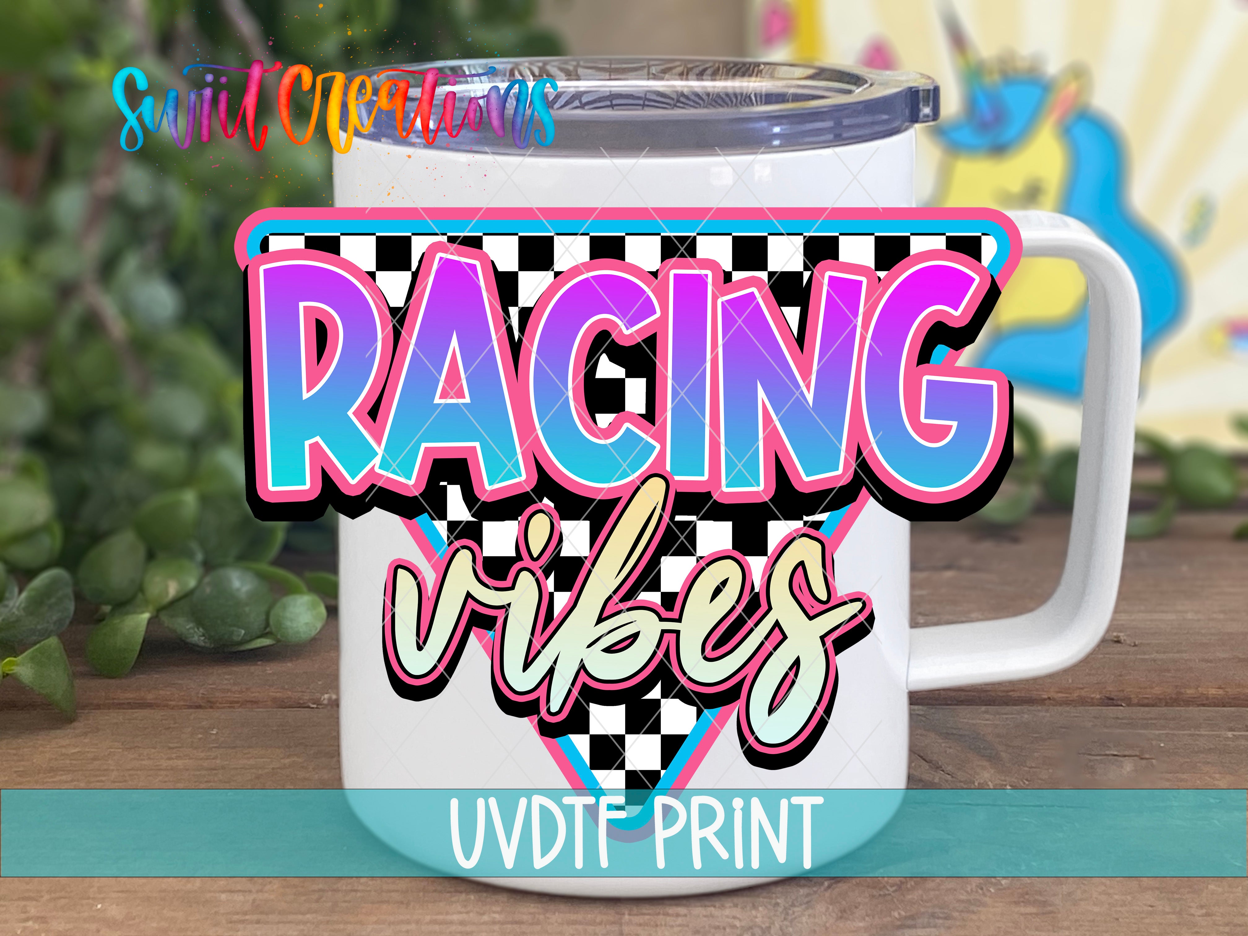 A white mug with a colorful design featuring the text "RACING VIBES" and a checkered pattern.