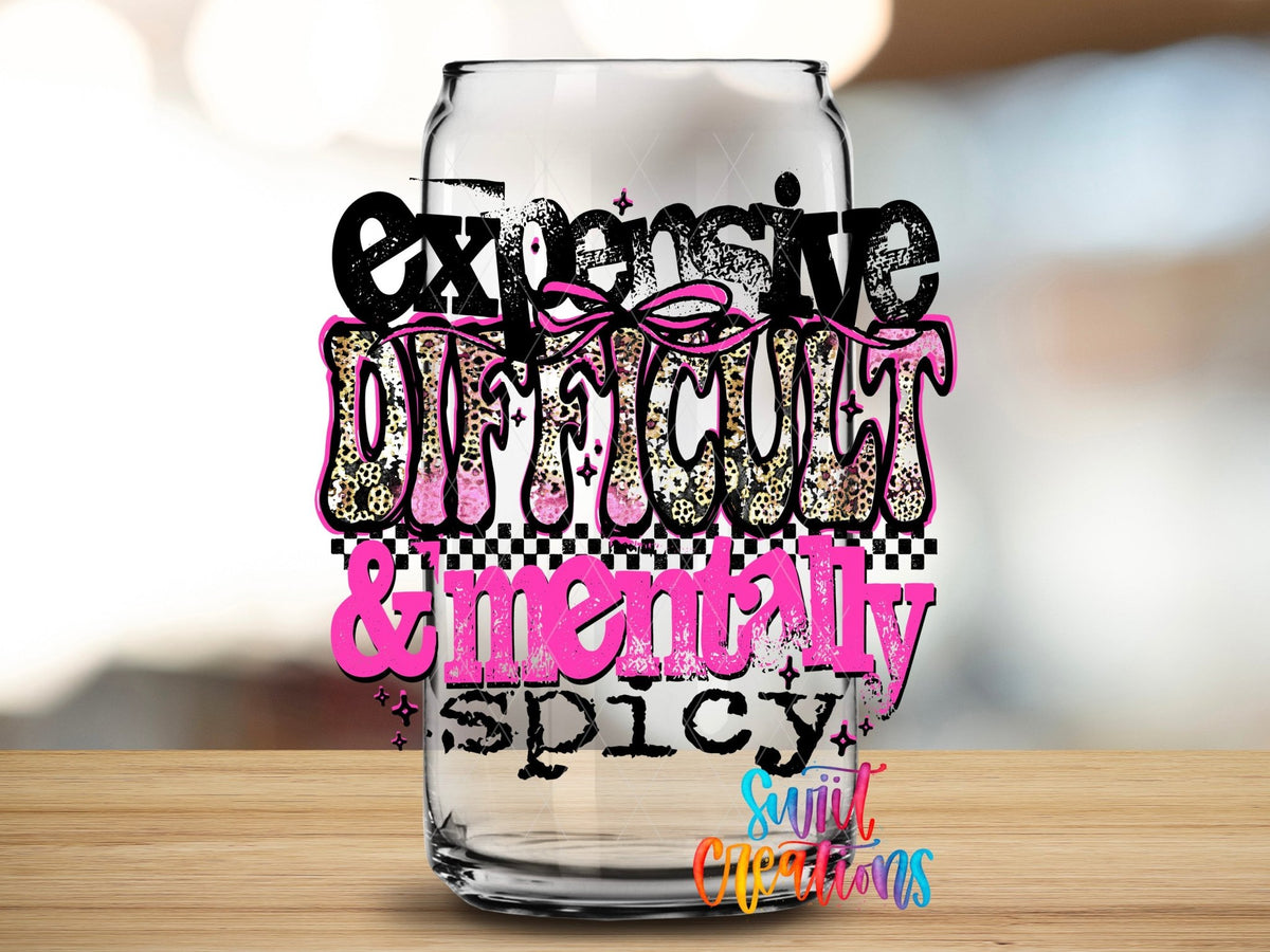Expensive Difficult And Mentally Spicy Sassy Quote UV DTF transfer applied to a clear glass can from Swiit Creations