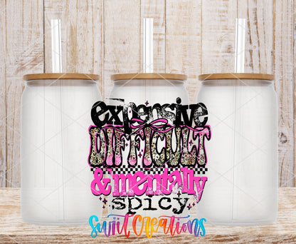 Expensive Difficult And Mentally Spicy Sassy Quote UV DTF transfer applied to a clear glass can set from Swiit Creations