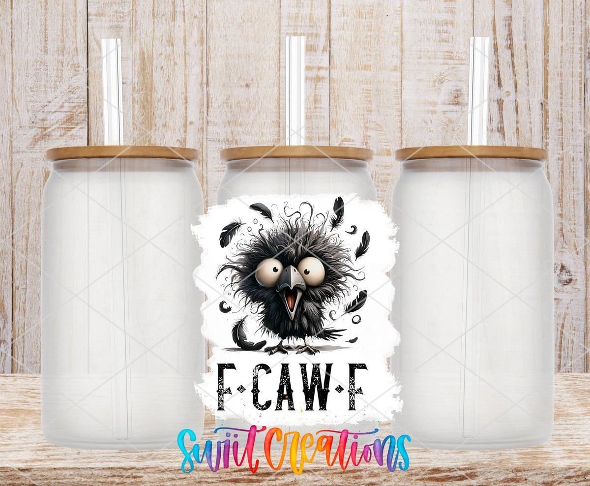F Caw F UV DTF transfer applied to a clear glass can set from Swiit Creations