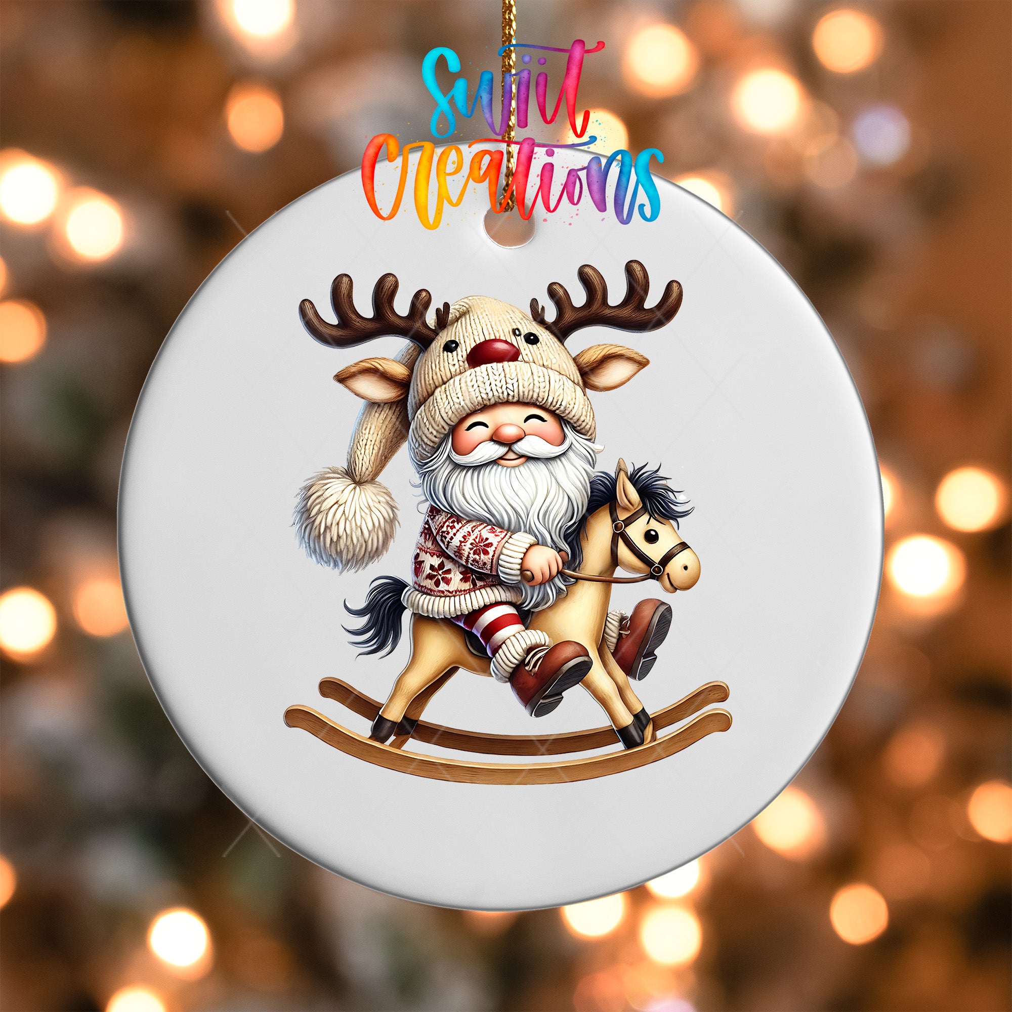 A white ornament with a cartoon image of Santa Claus riding a rocking horse, wearing a hat with antlers.