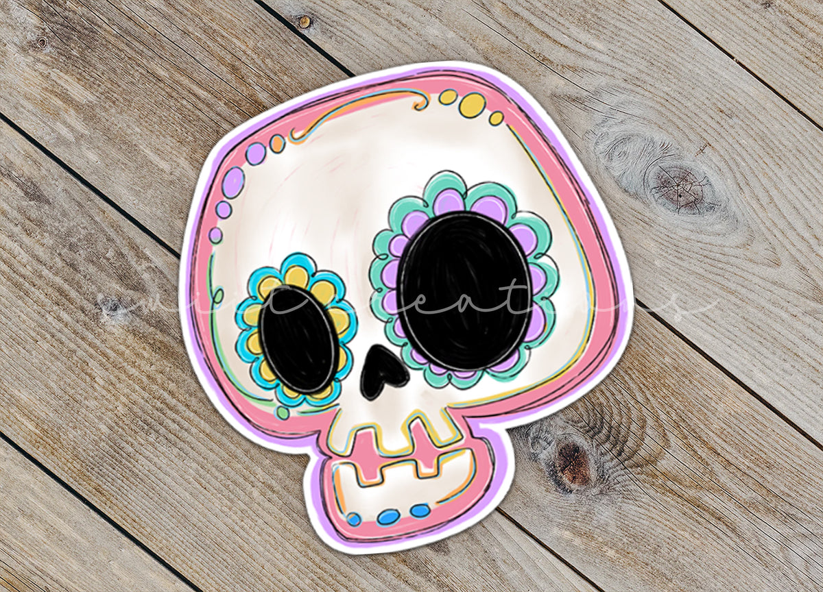 a paper plate with a skull painted on it