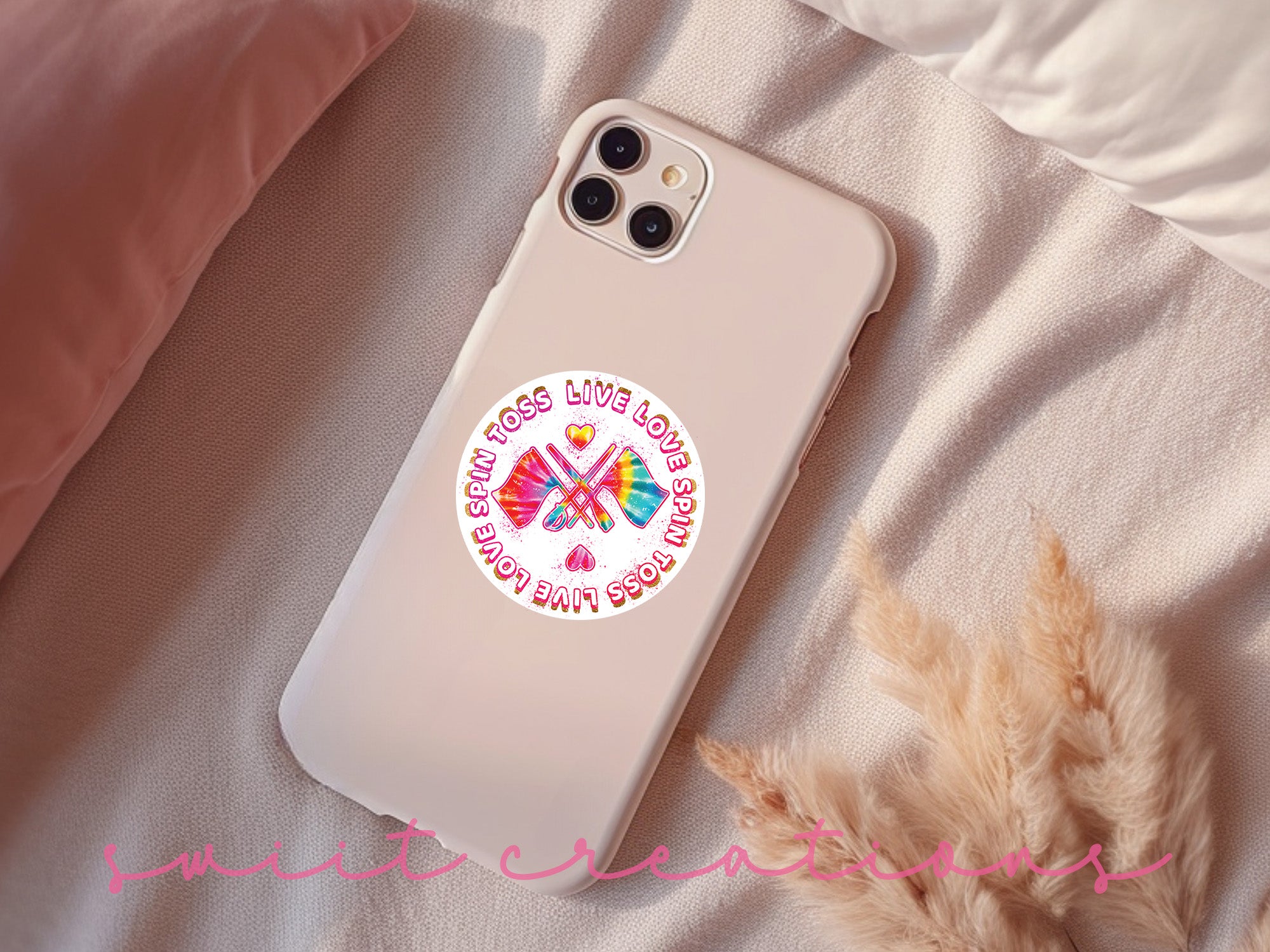 a phone case sitting on top of a bed
