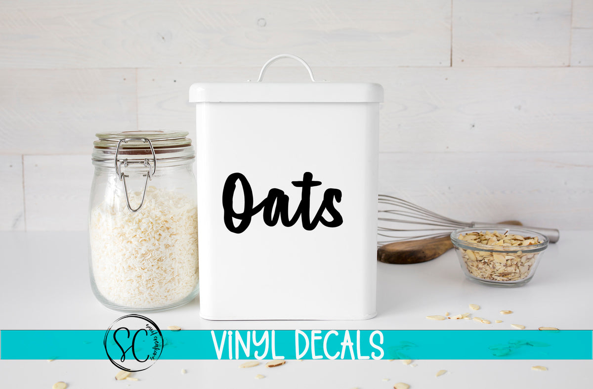 a white canister filled with oats next to a bowl of oats