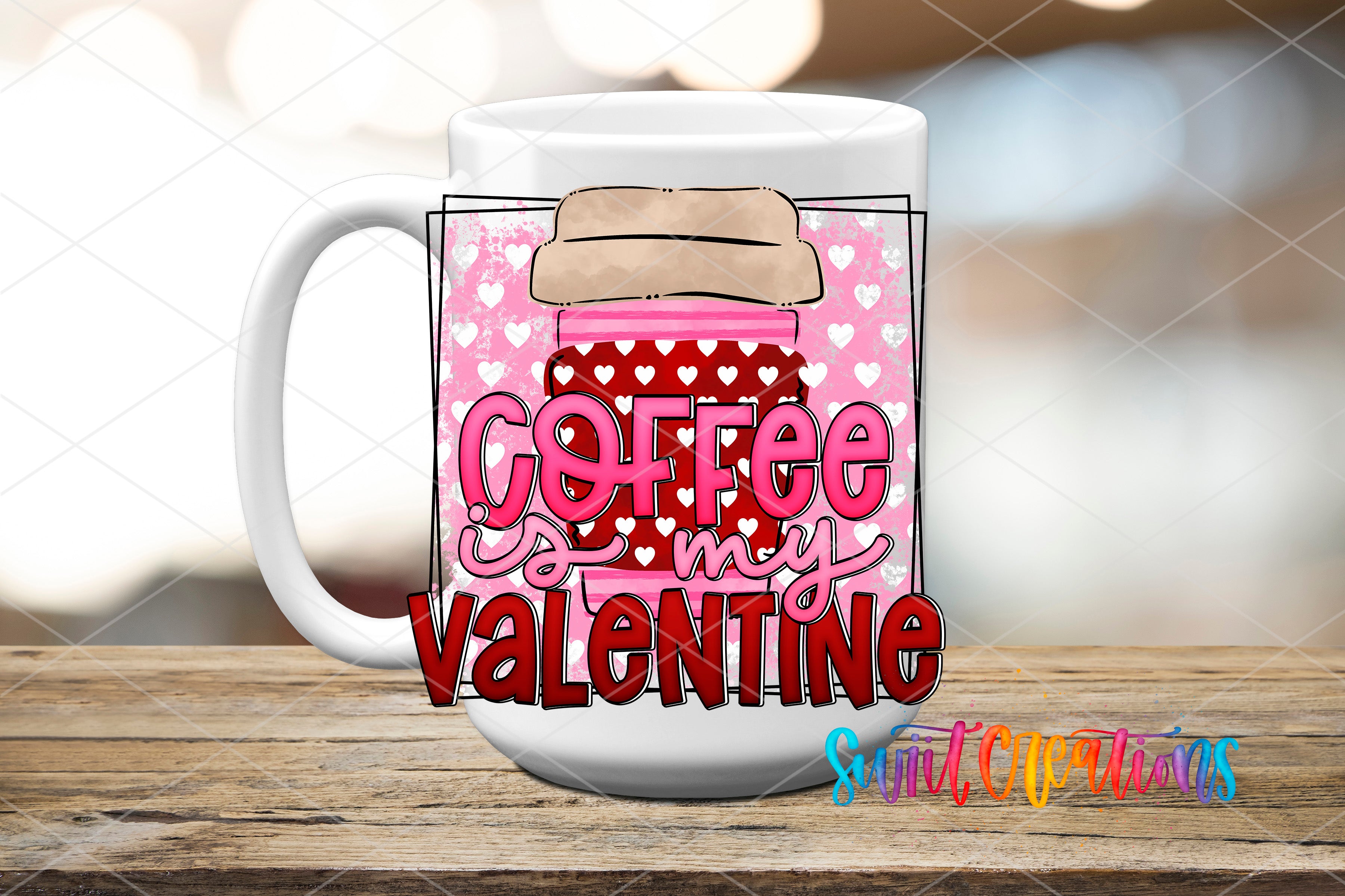 A white coffee mug with a pink and red design featuring a jar of coffee and the text "Coffee is my Valentine" printed on it.