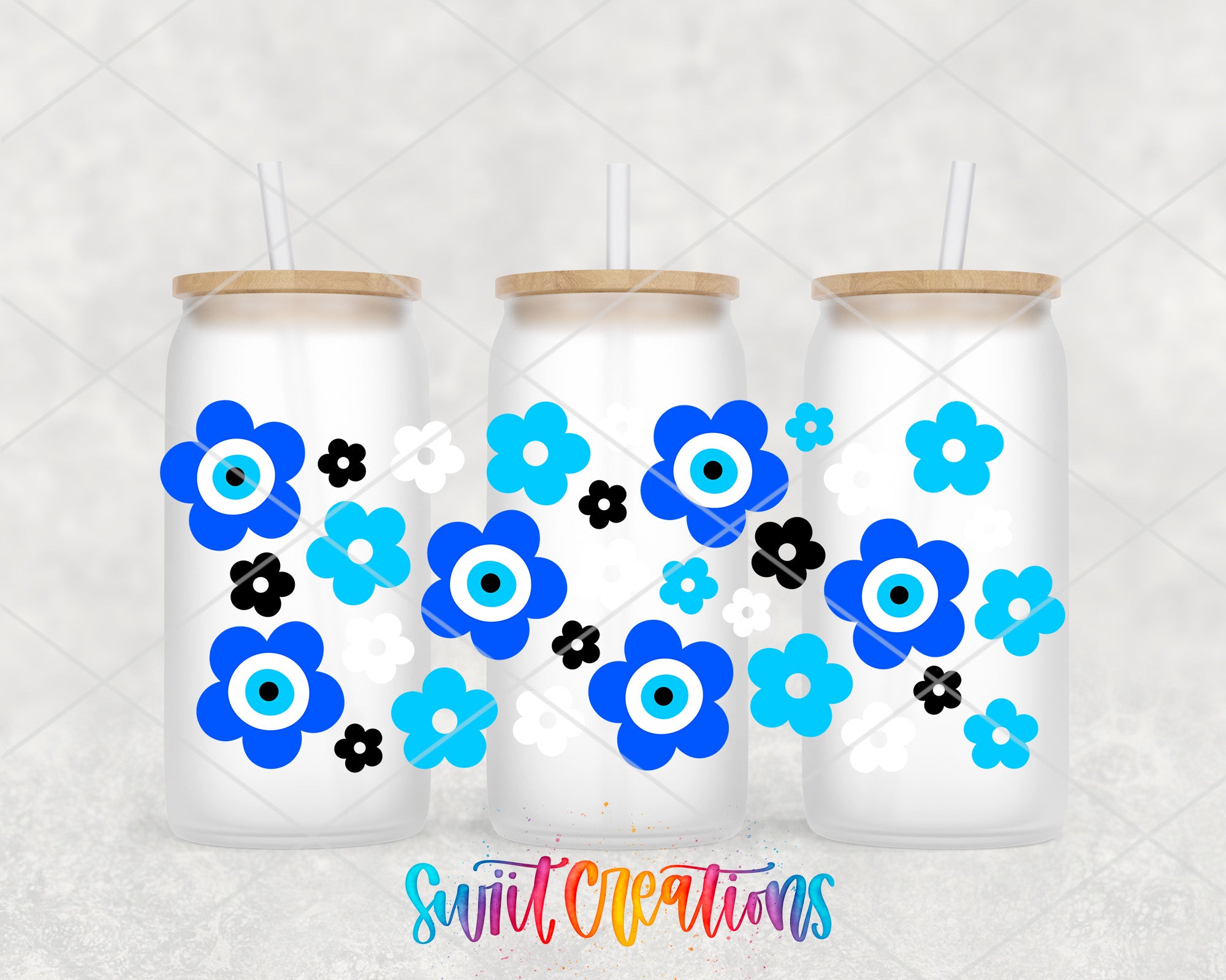 three glass tumblers with blue and white flower designs on them, each with a straw lid.