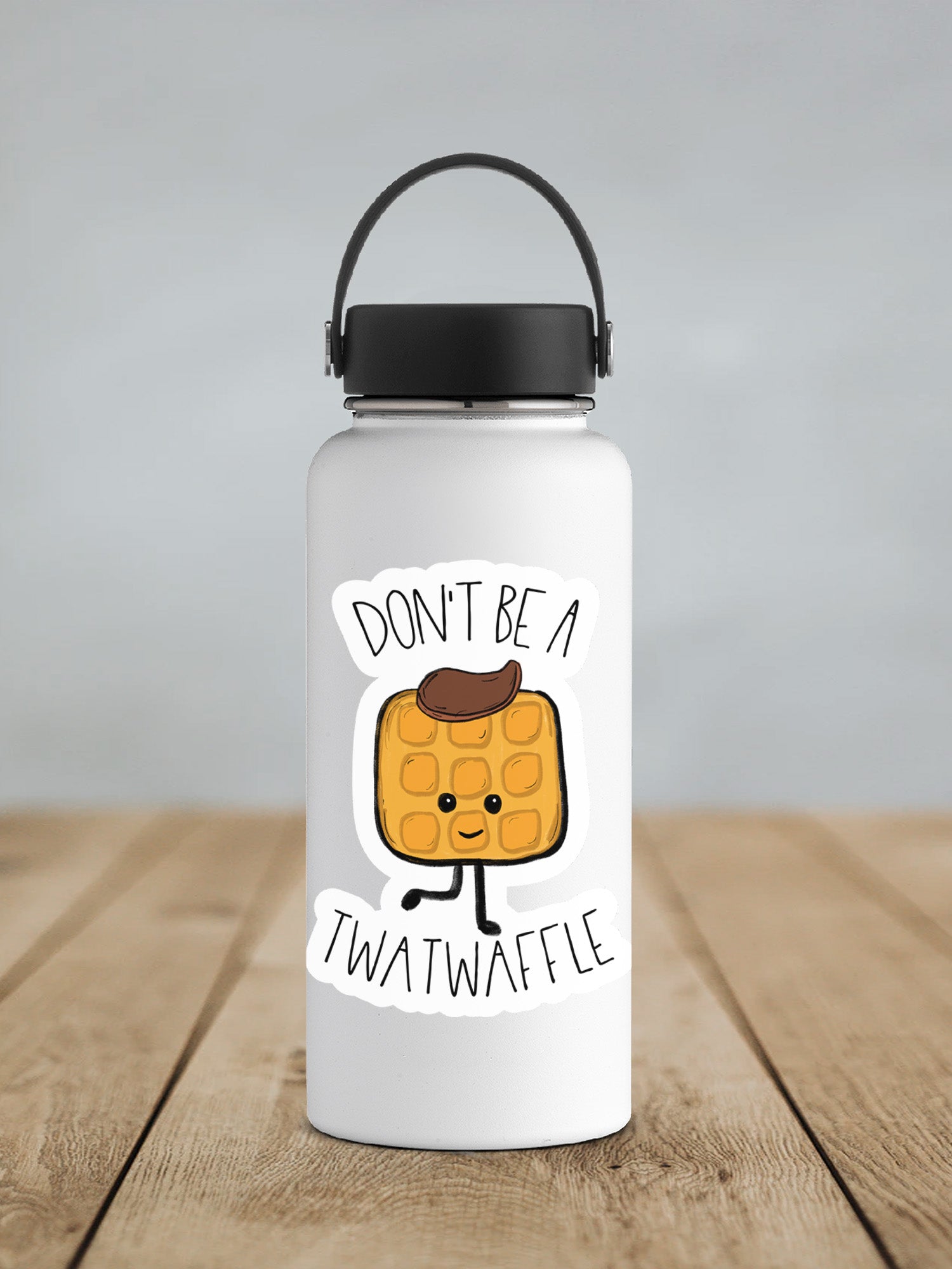 a white water bottle with a black lid on a wooden table