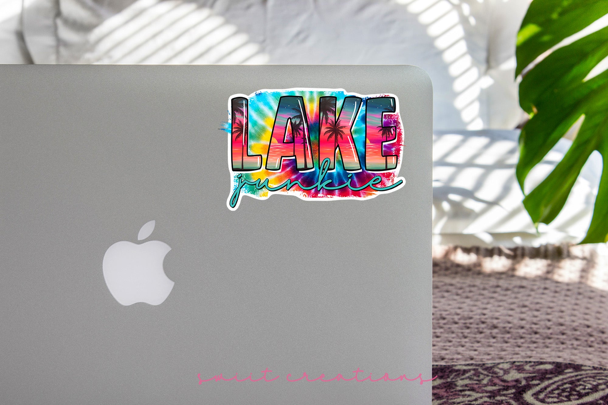a laptop with a sticker that says lake