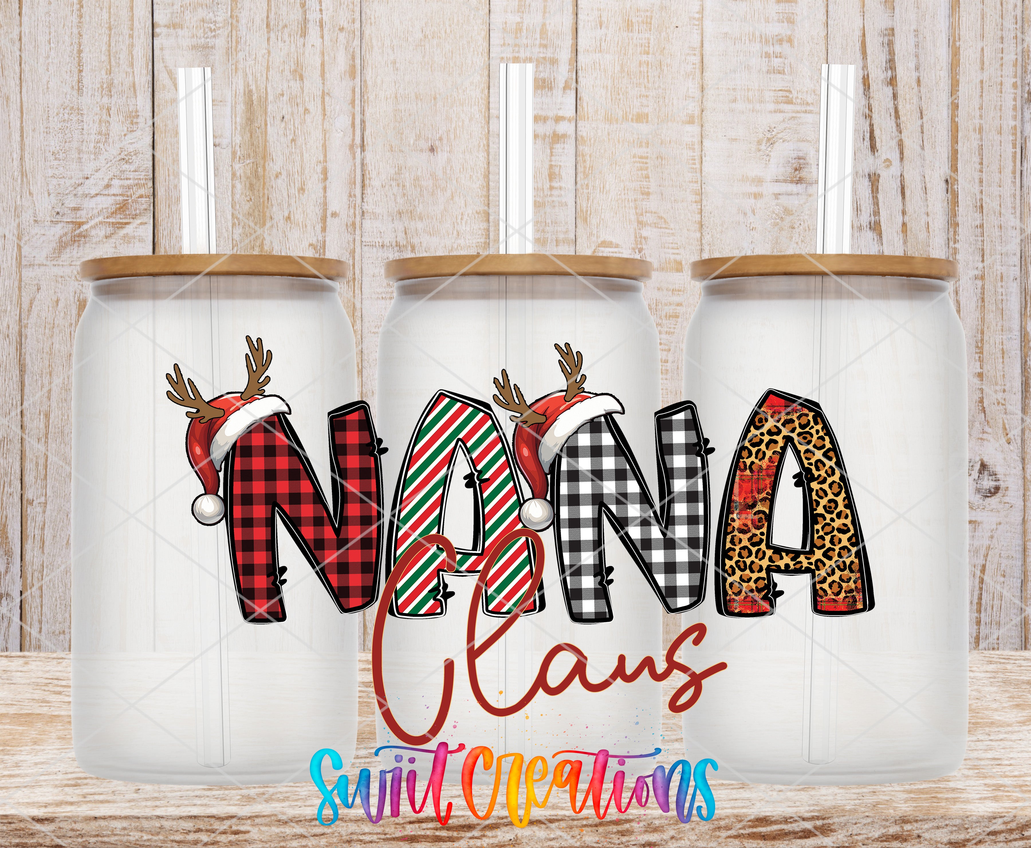 Three glass tumblers with the word "NANA" written on them, along with decorative elements such as reindeer and Santa hats.
