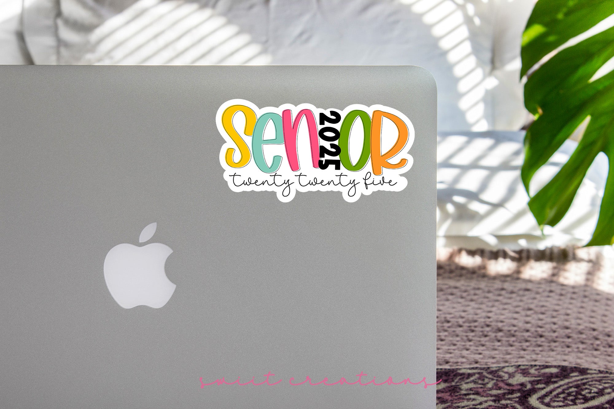 a laptop computer sitting on top of a table