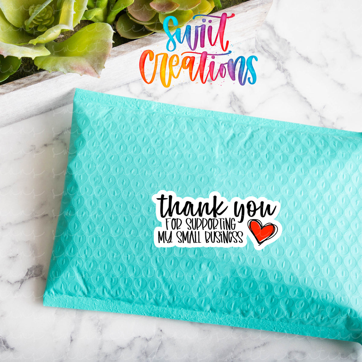 a blue envelope with a thank you message on it