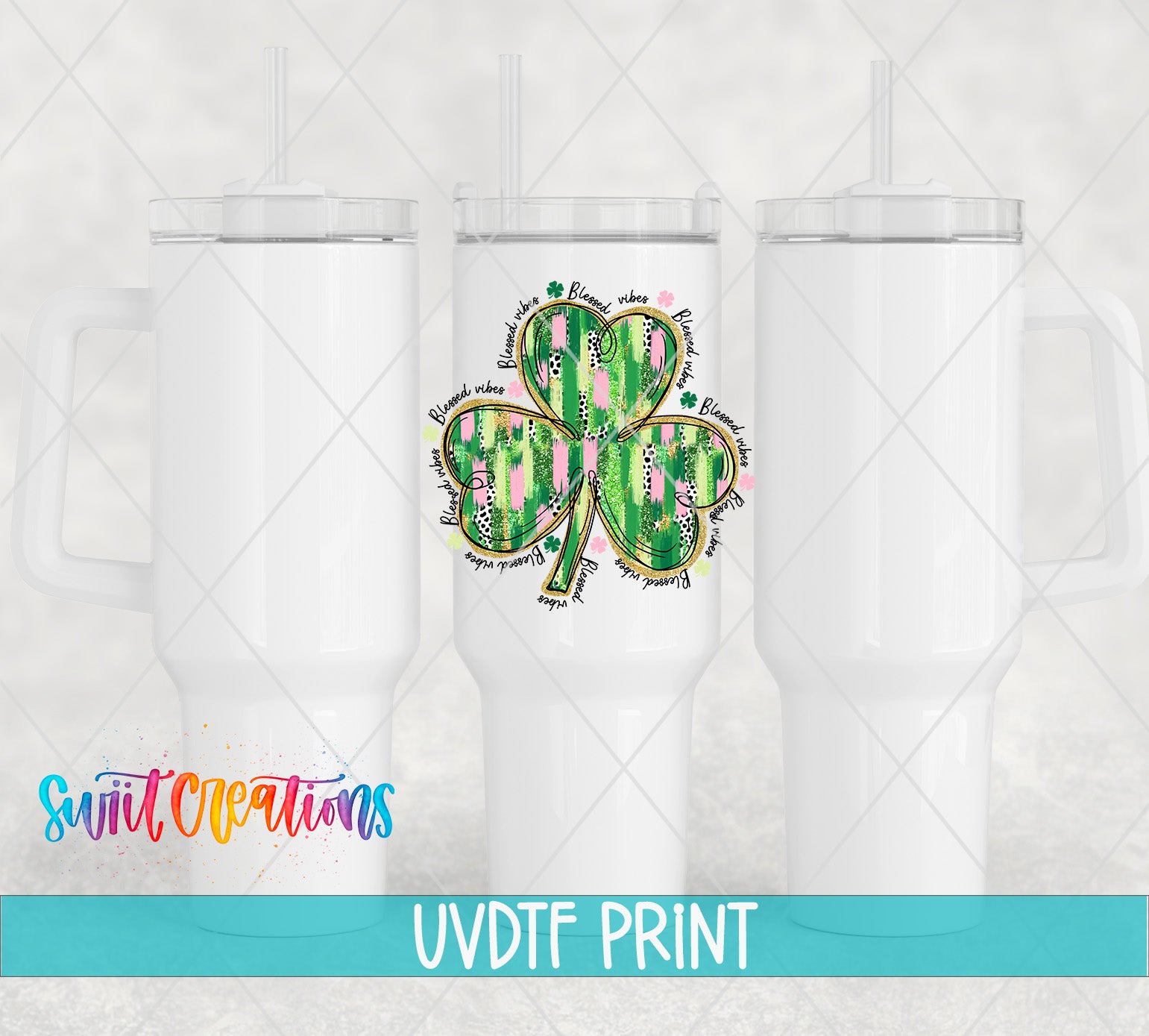 three white tumblers with a colorful design of a shamrock on them.