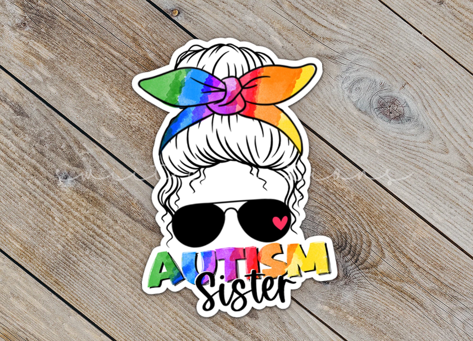 a sticker with the words autism sister on it