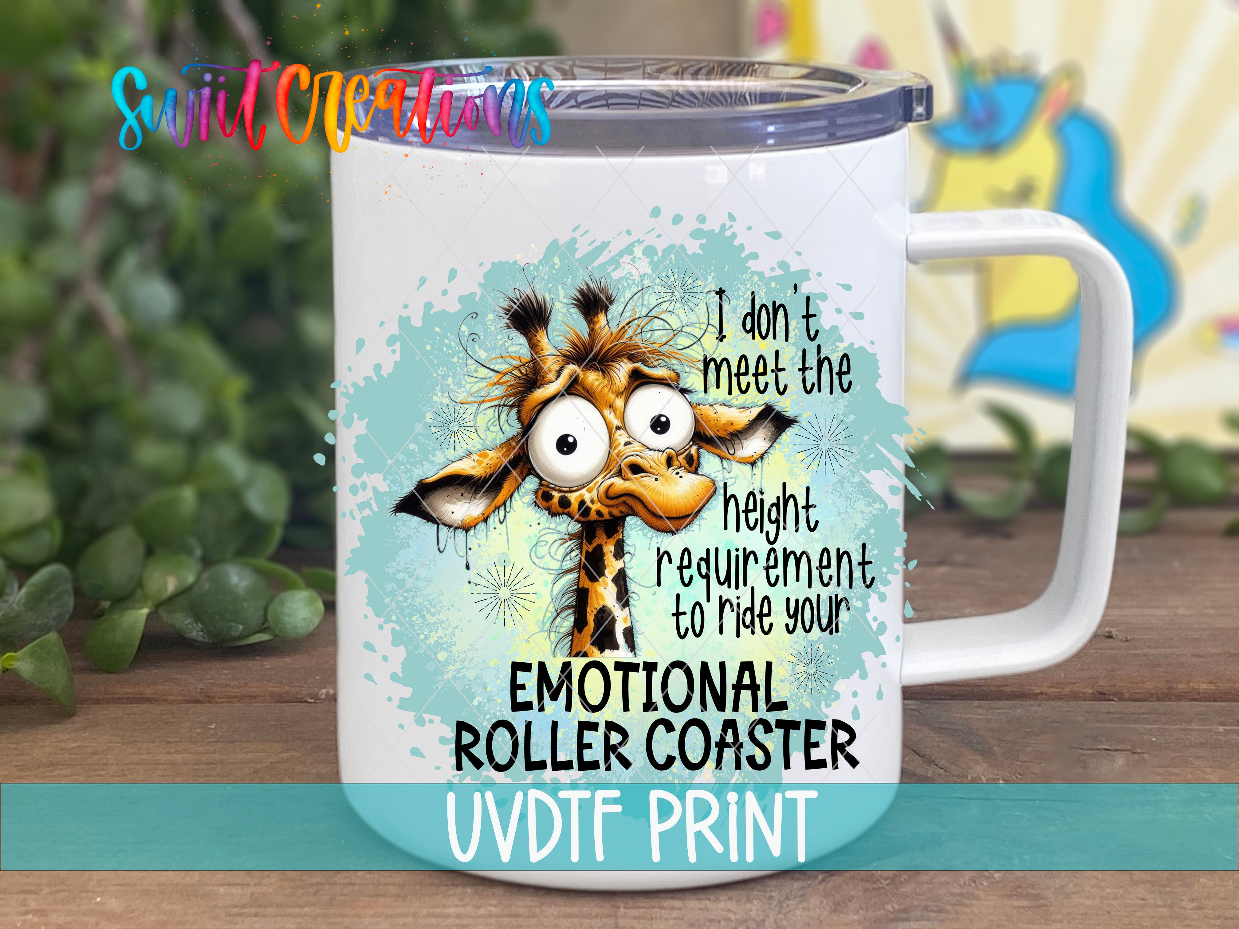 A mug with a giraffe design and text on it, placed on a wooden surface.