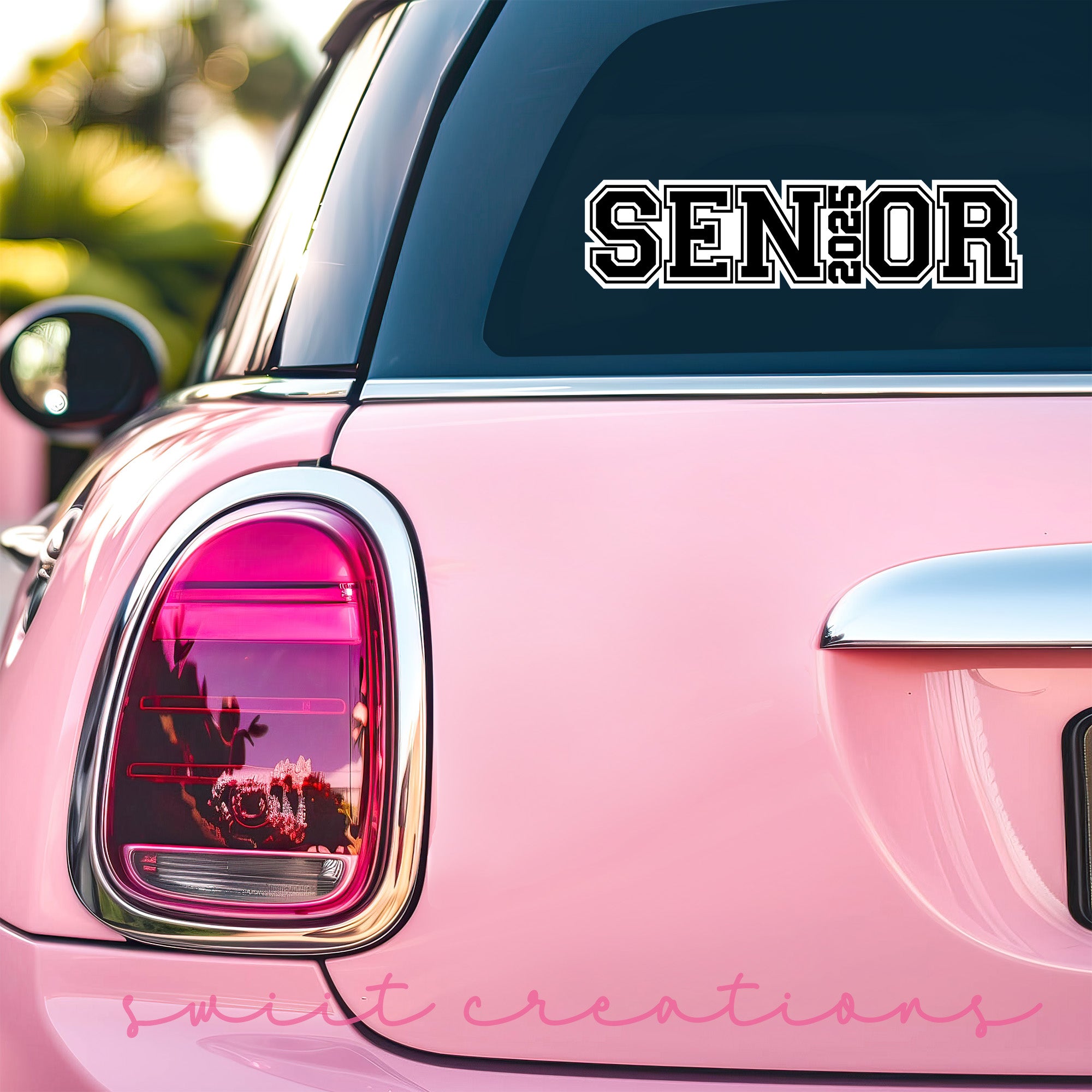 a pink car with the word senior on it