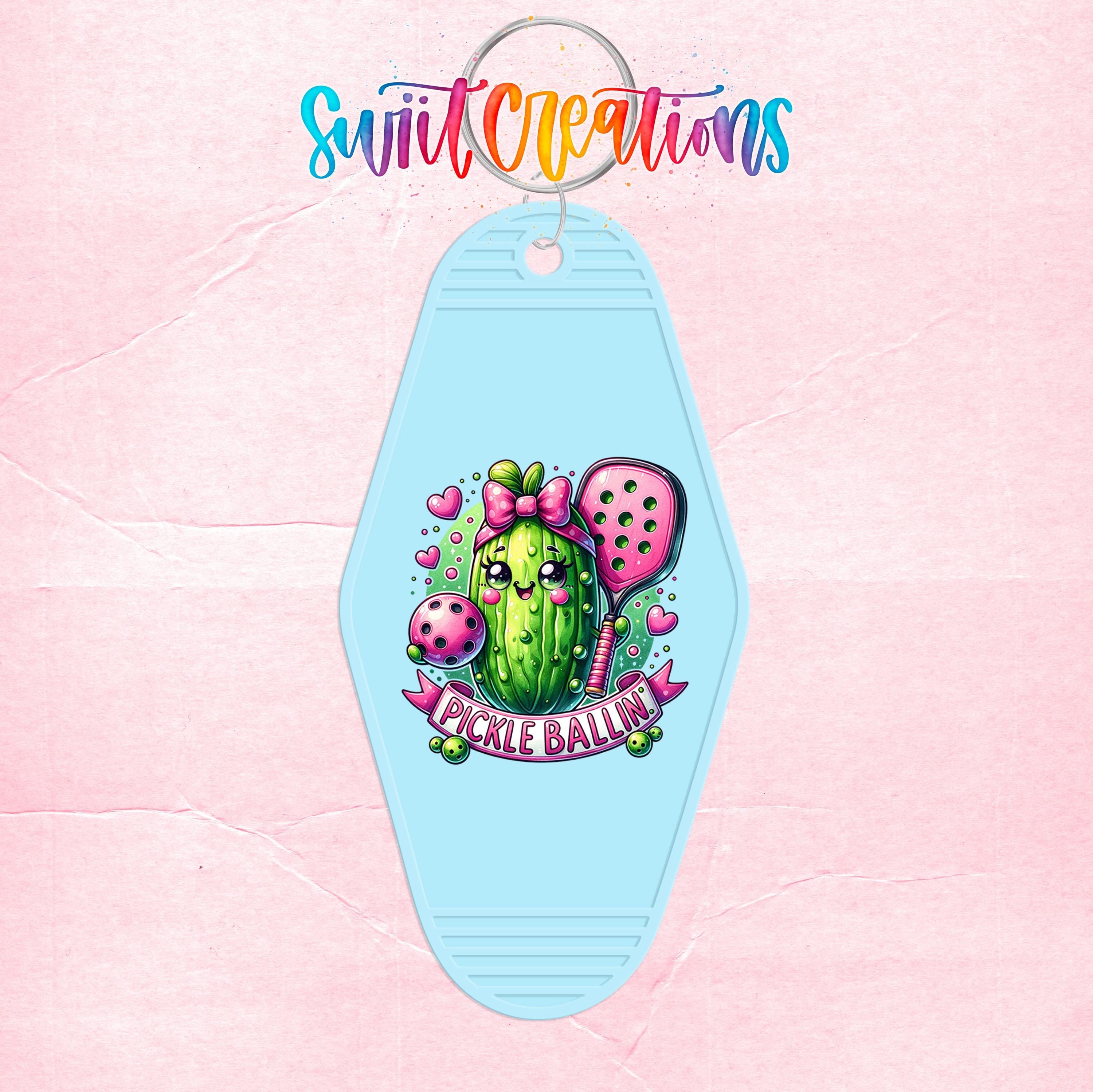 A keychain with a colorful illustration of a cactus and the text "Pickle Ballin" on it.