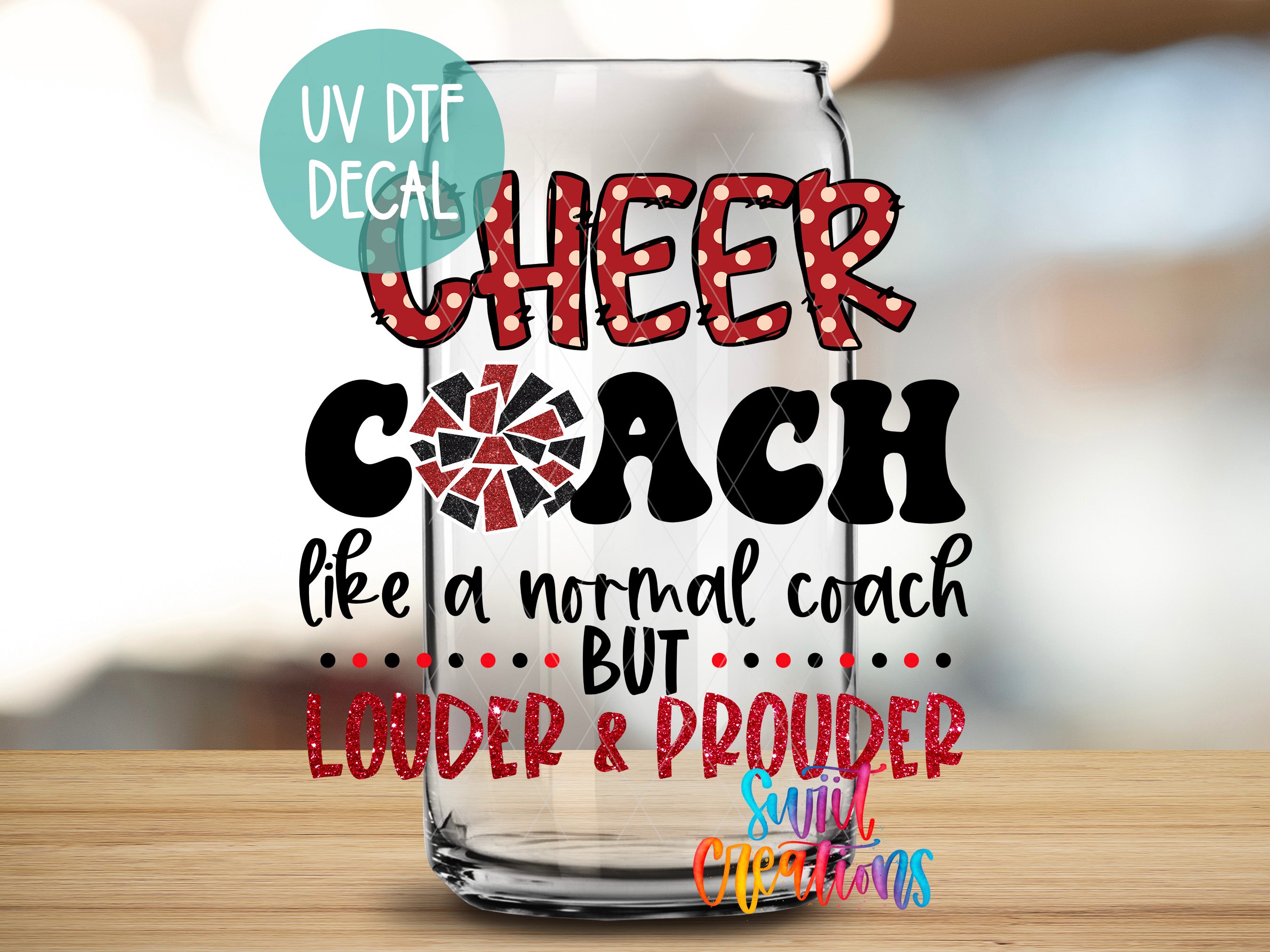 a glass with a quote on it sitting on a table