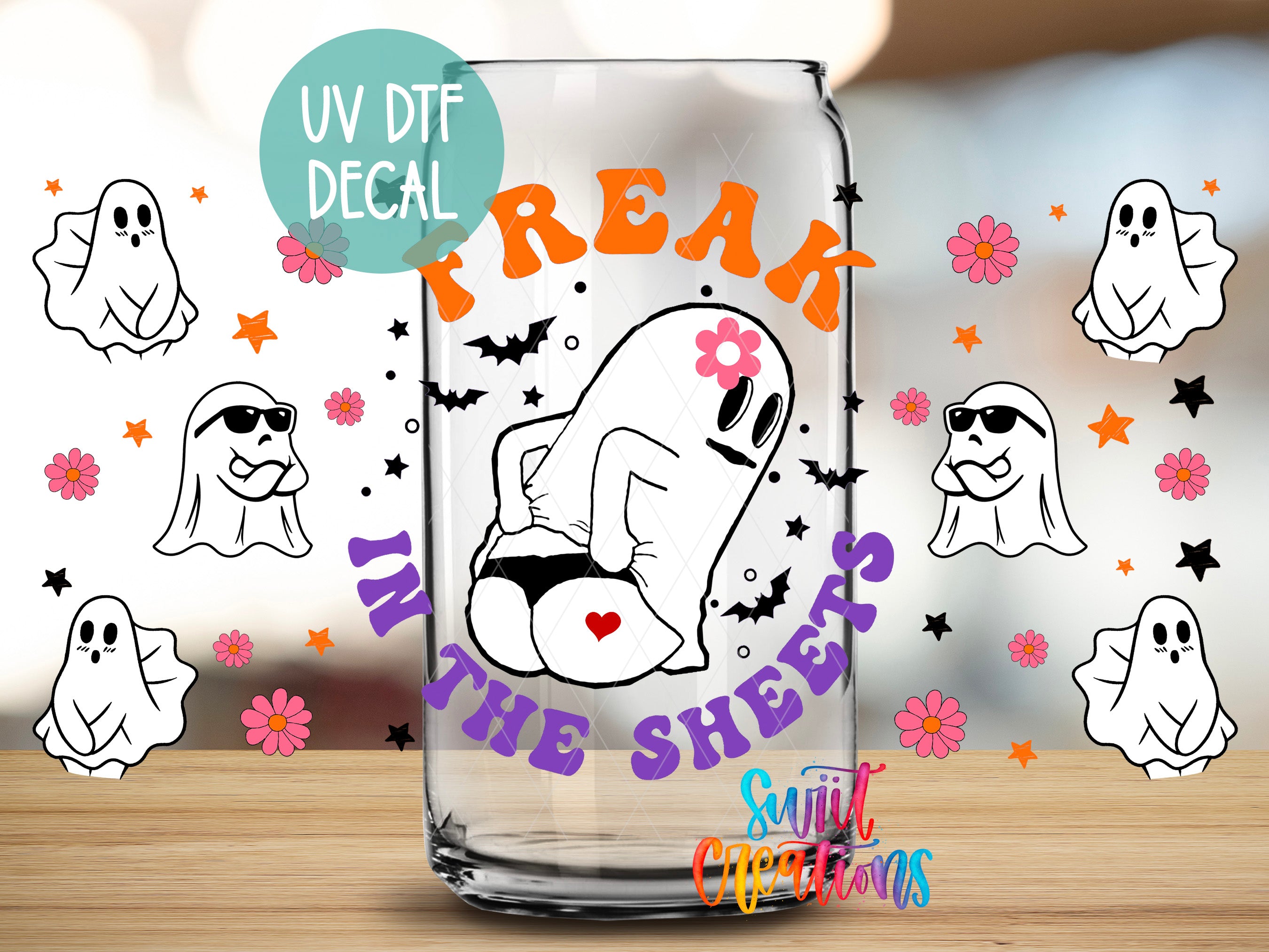 a glass can with a Halloween-themed design, including a ghost character and various ghost-related elements.