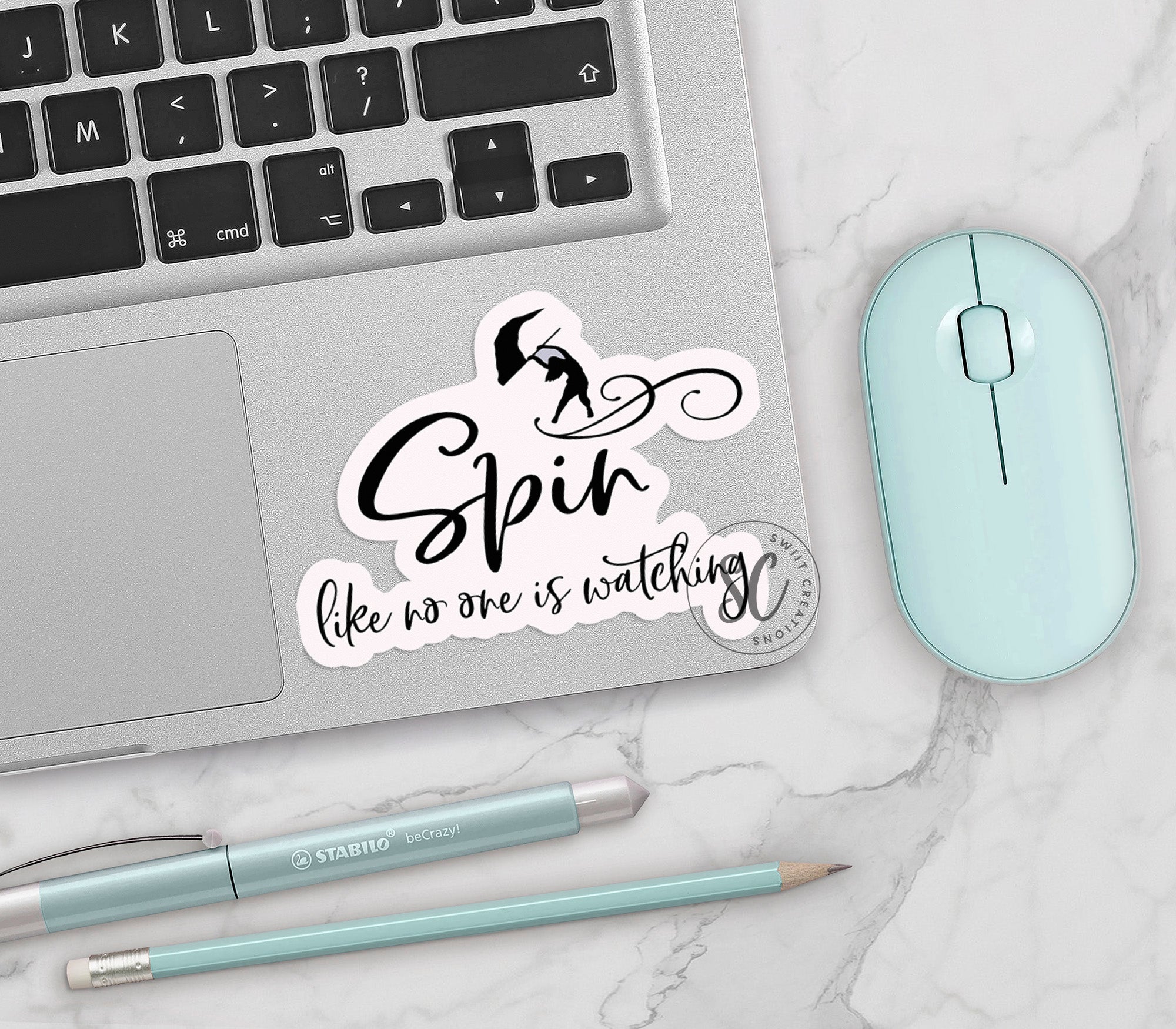 a laptop computer sitting next to a mouse and keyboard