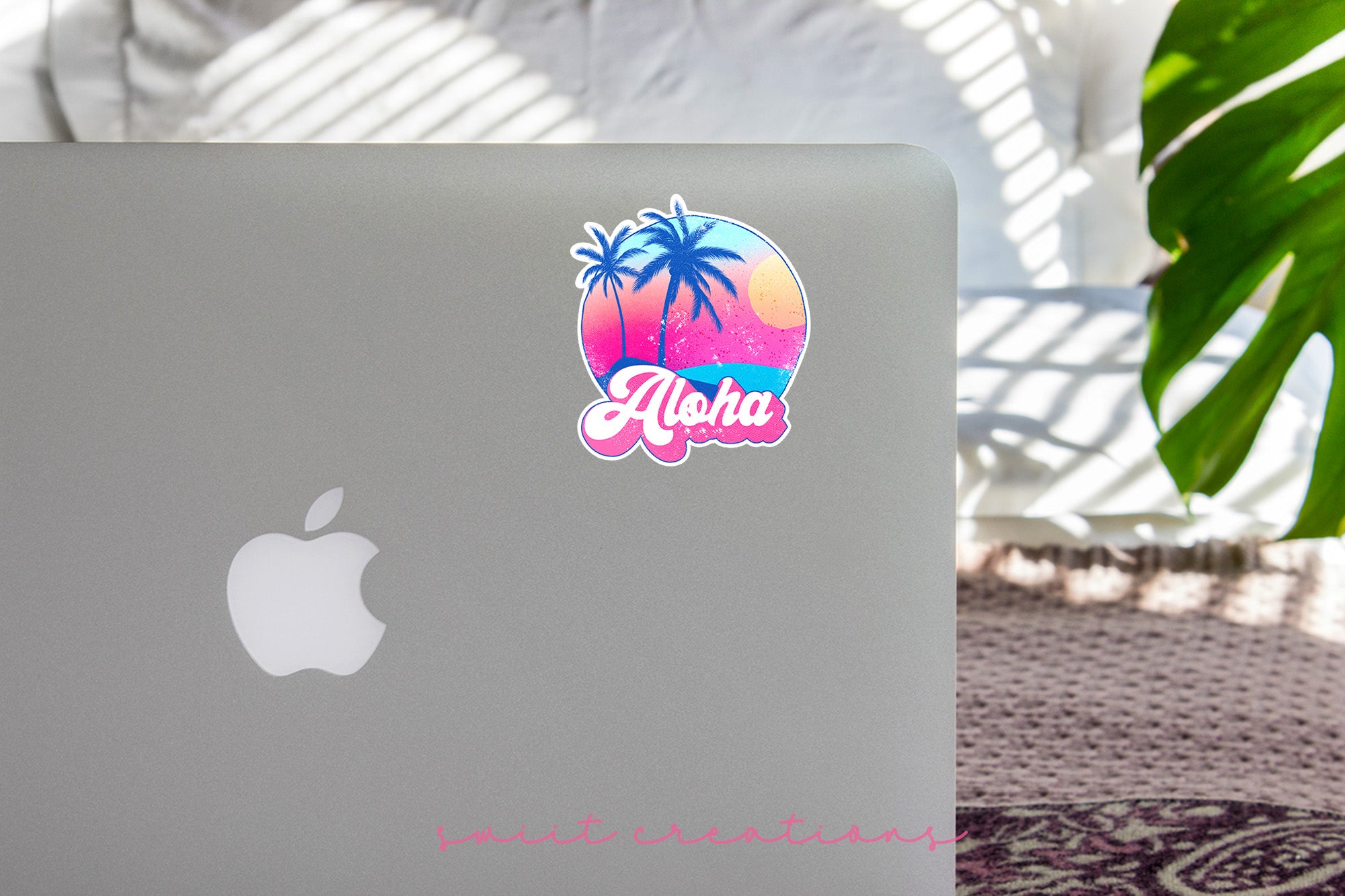 a laptop computer sitting on top of a table