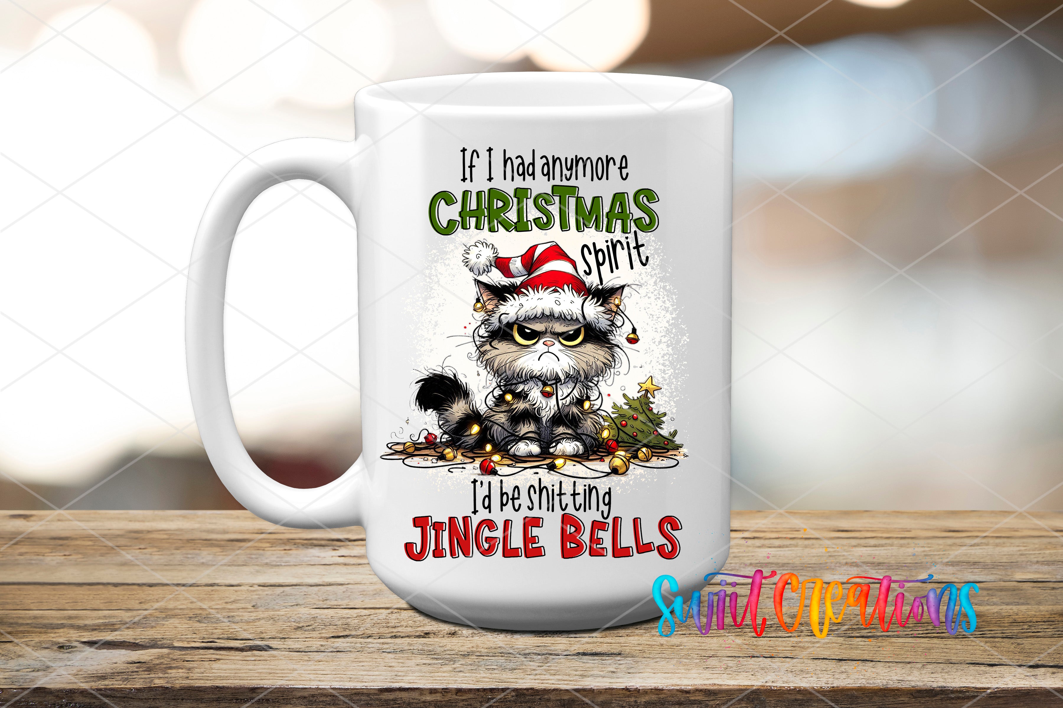 A white ceramic mug with a humorous Christmas-themed design featuring a cat wearing a Santa hat and the text "If I had any more Christmas spirit, I'd be shitting Jingle Bells".