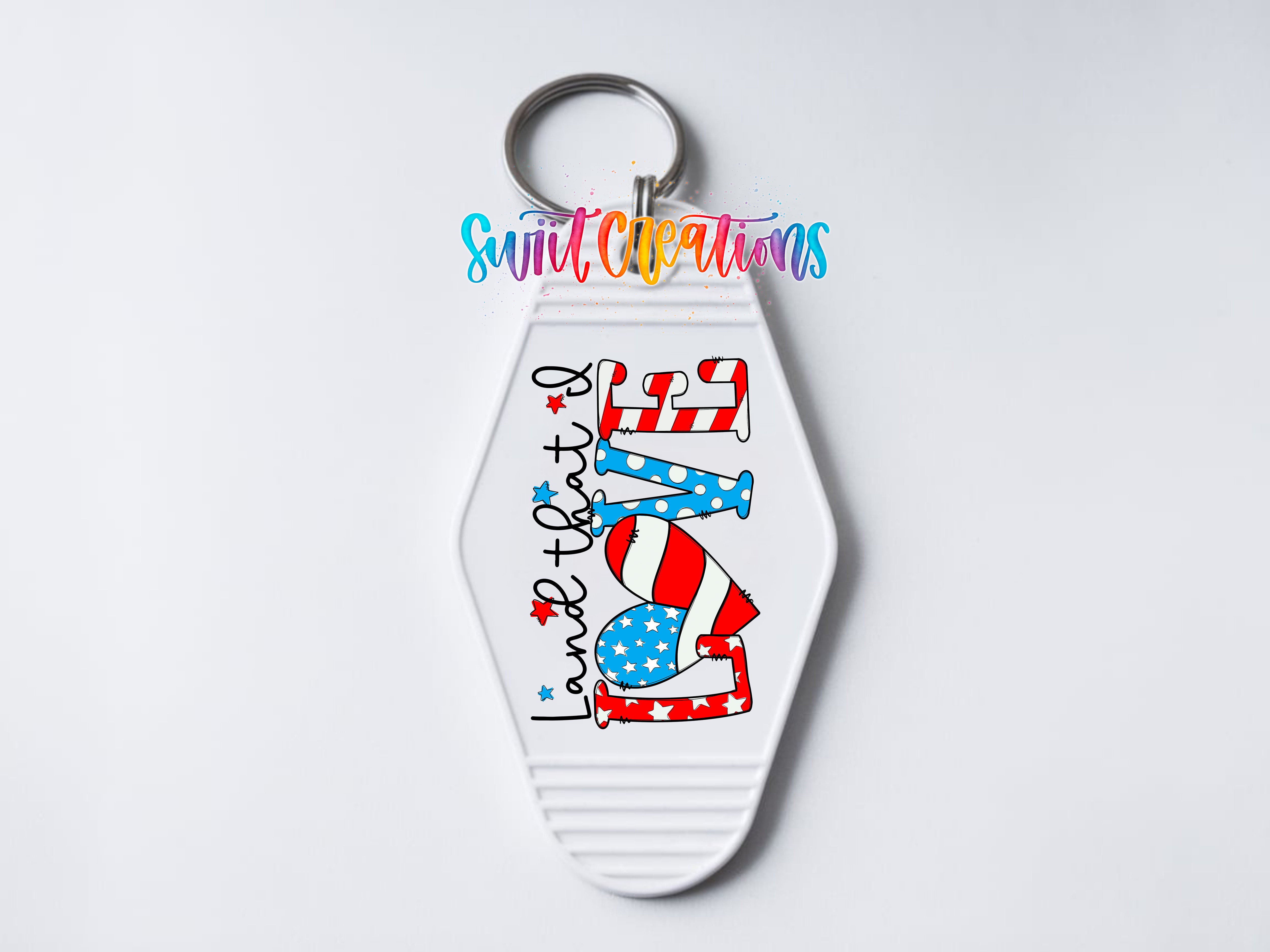 A keychain with a patriotic design featuring the word "LOVE" in red, white, and blue colors, along with stars and stripes.