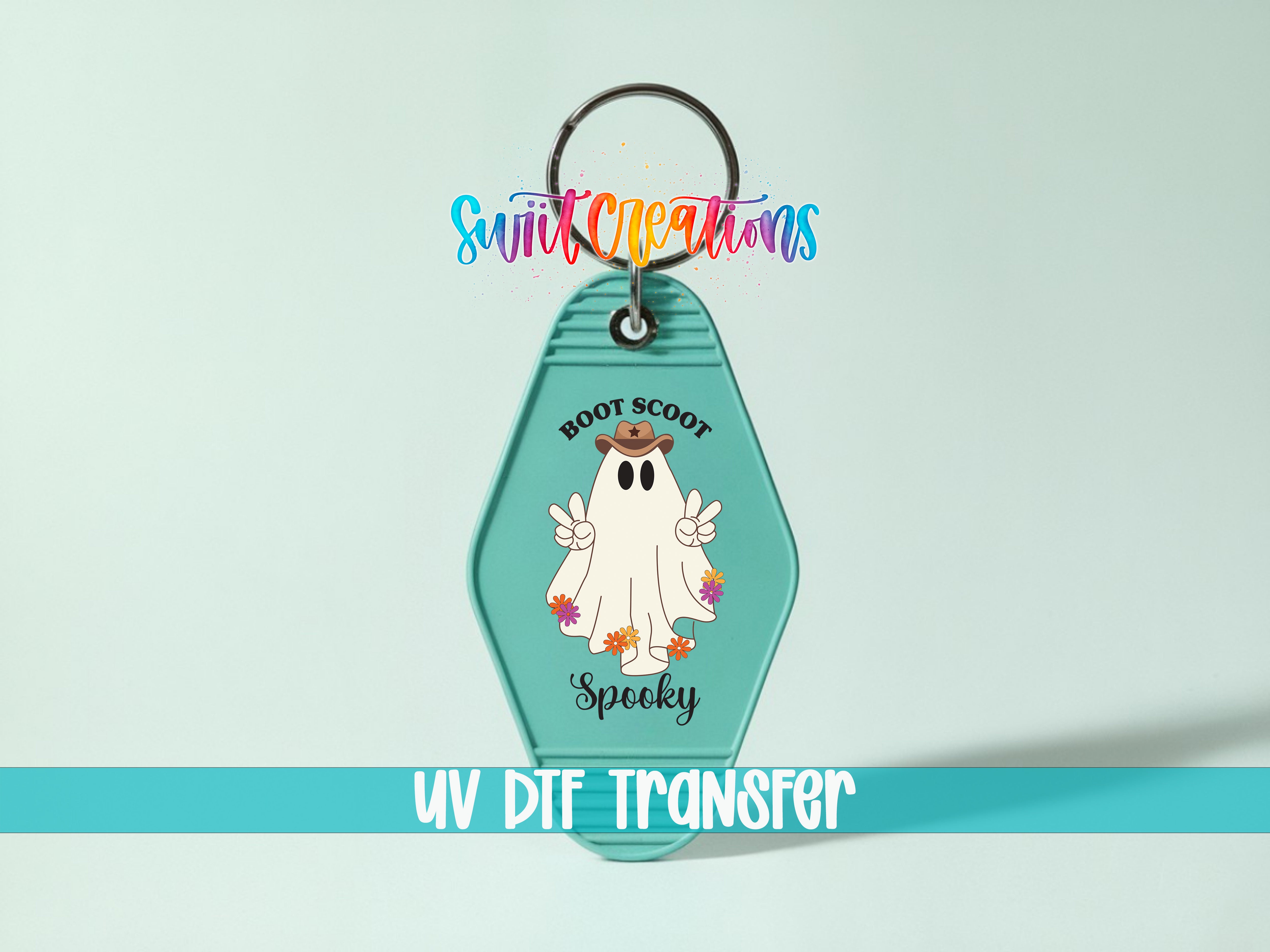 A keychain with a cartoon ghost and the text "Boots Scoot Spooky" printed on it.