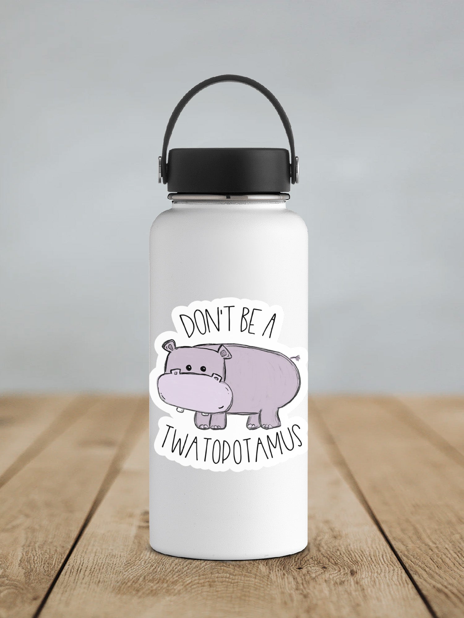 a water bottle with a sticker on it that says don't be a