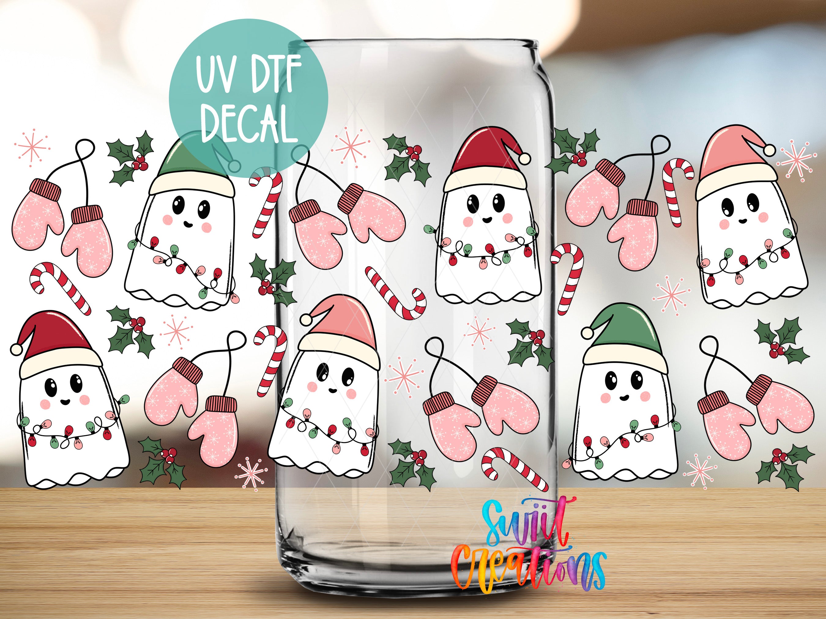 A glass jar with a festive Christmas-themed decal featuring cartoon-style ghost characters wearing Santa hats and mittens, along with Christmas-themed elements such as holly, mistletoe, and snowflakes.