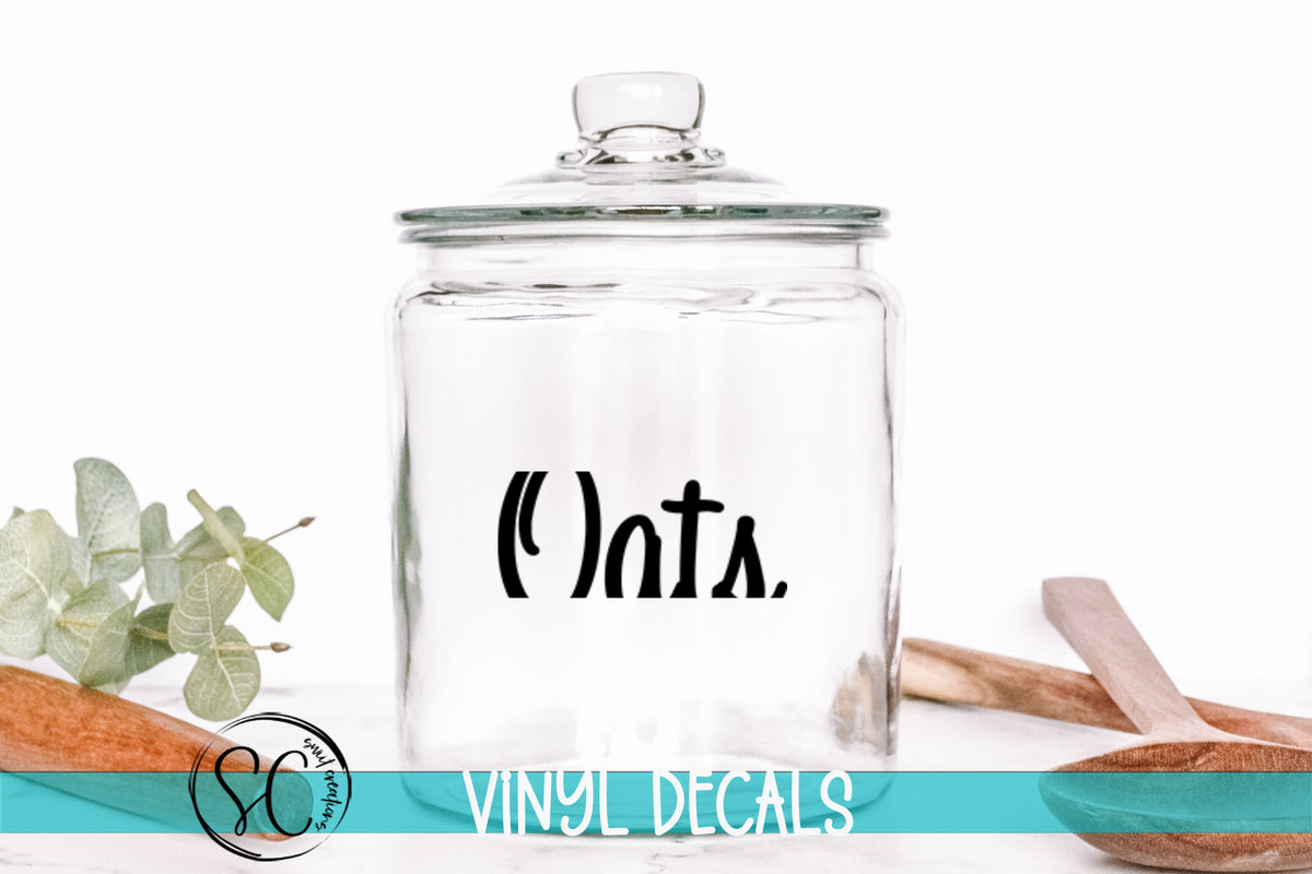 a glass jar with the word otts on it