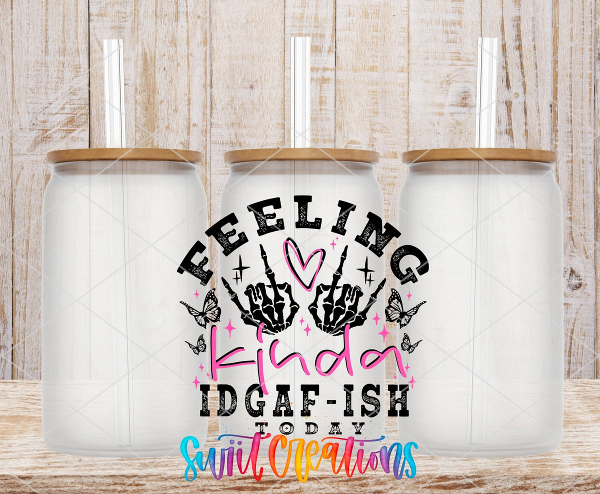 Feeling Kinda IDGAF-ish Today UV DTF transfer applied to a clear glass can set from Swiit Creations