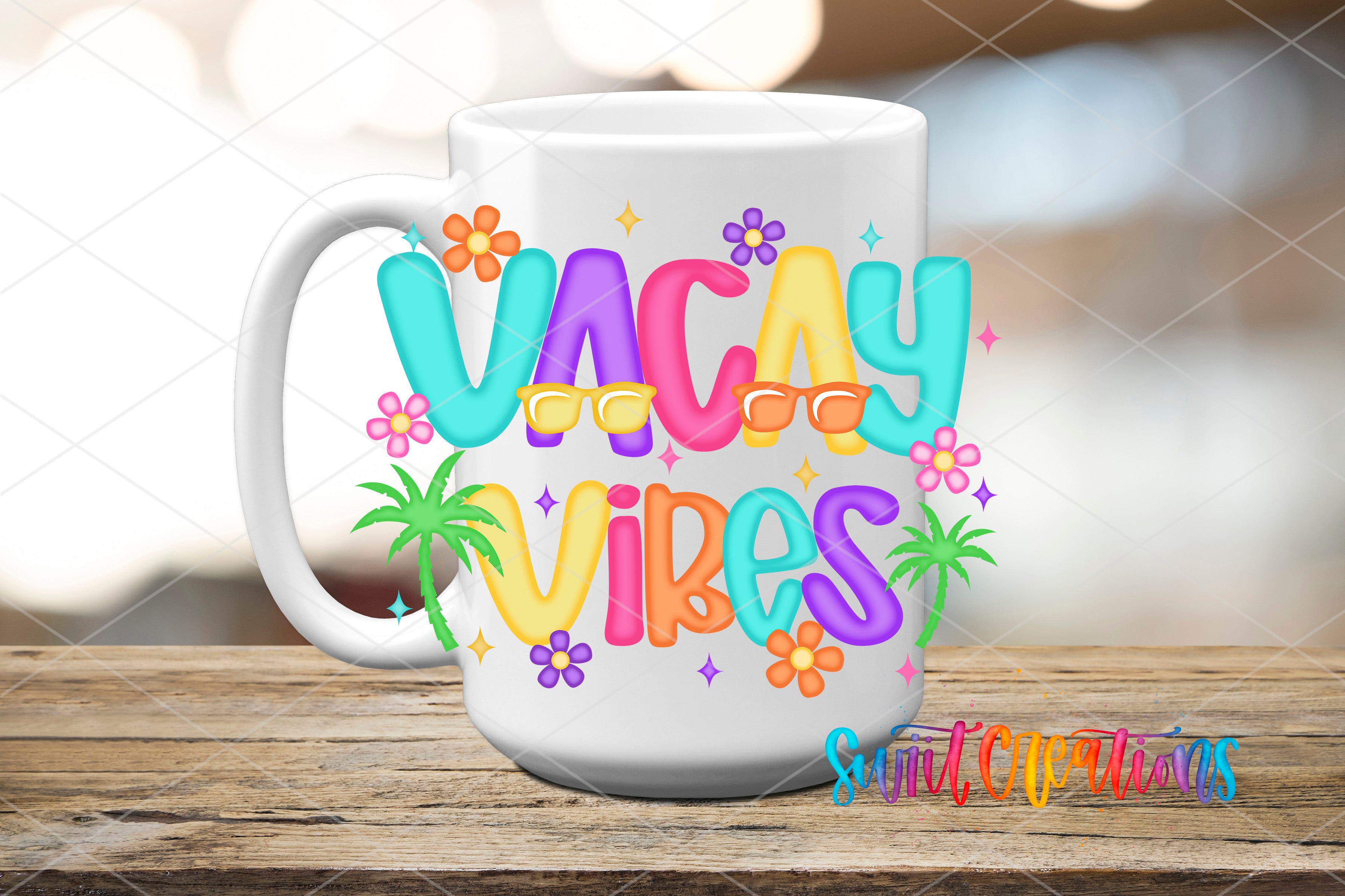 A white mug with colorful text and graphics that says "Vacay vibes" on it, placed on a wooden surface.