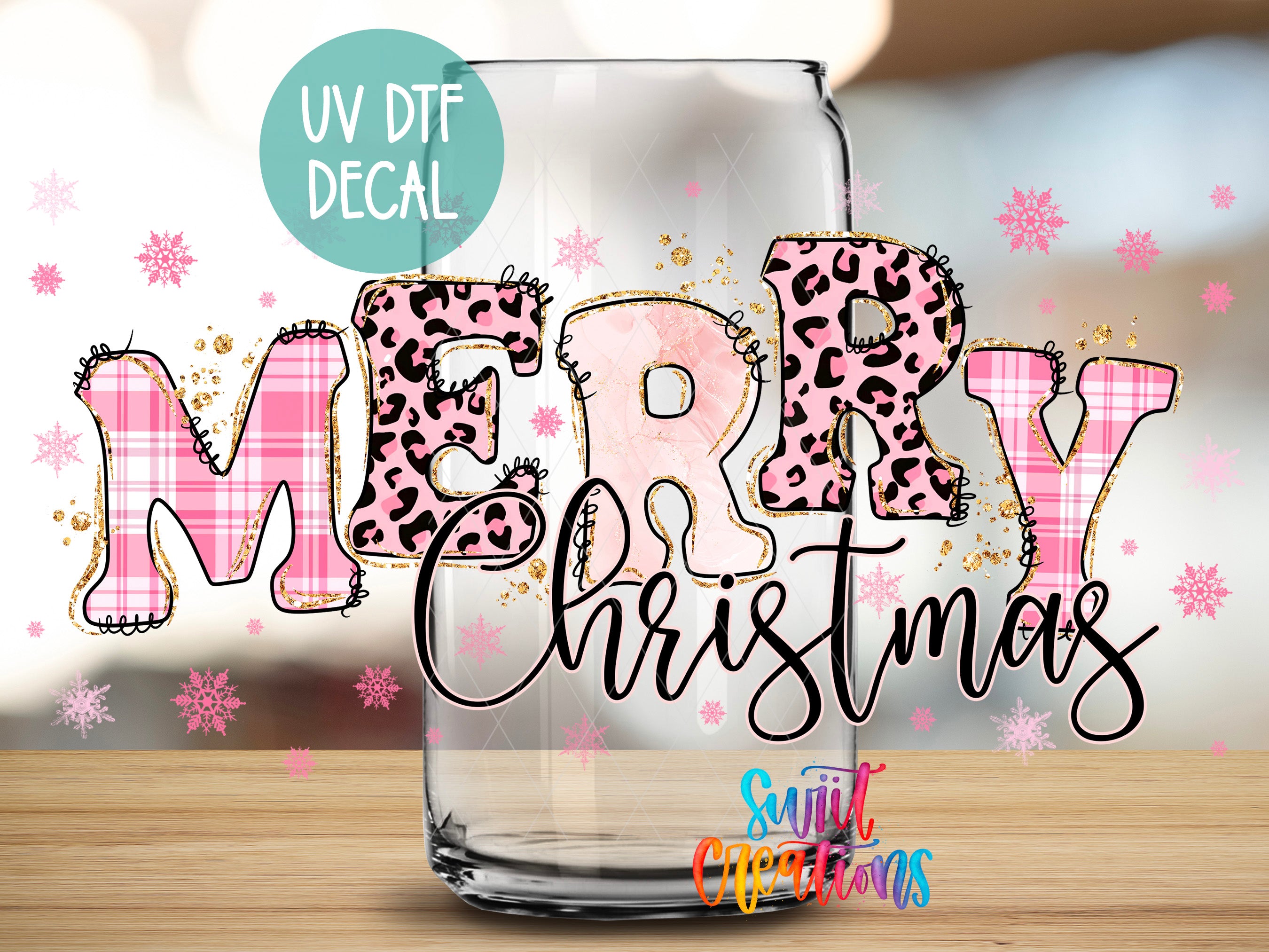 A glass with the text "MERRY CHRISTMAS" written on it, surrounded by snowflakes and leopard print decorations.