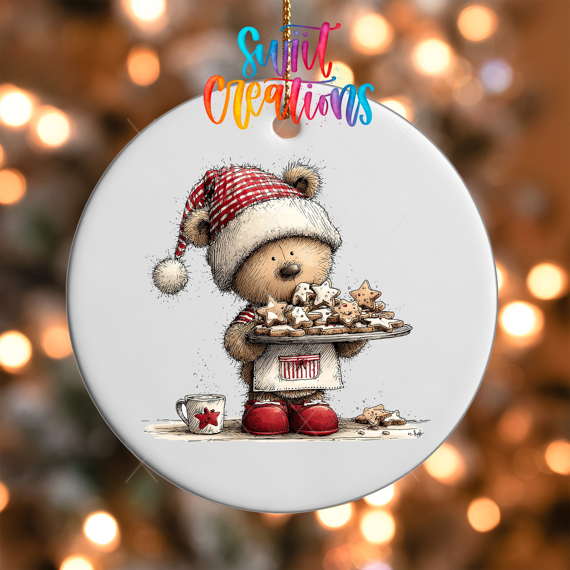A white ceramic ornament featuring a teddy bear wearing a Santa hat and holding a tray of cookies, with a mug and a star decoration on the tray.