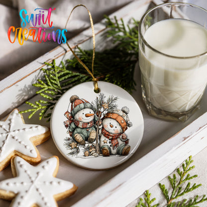 a festive scene with a snowman ornament, cookies, and a glass of milk on a white tray.