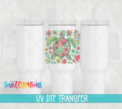 Floral Sea Turtle UV DTF transfer applied to a white tumbler set from Swiit Creations