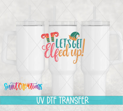 Let’s Get Elfed Up UV DTF transfer applied to a white tumbler set from Swiit Creations
