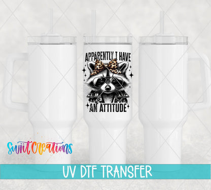 Funny Raccoon Apparently I Have An Attitude UV DTF transfer applied to a white tumbler set from Swiit Creations