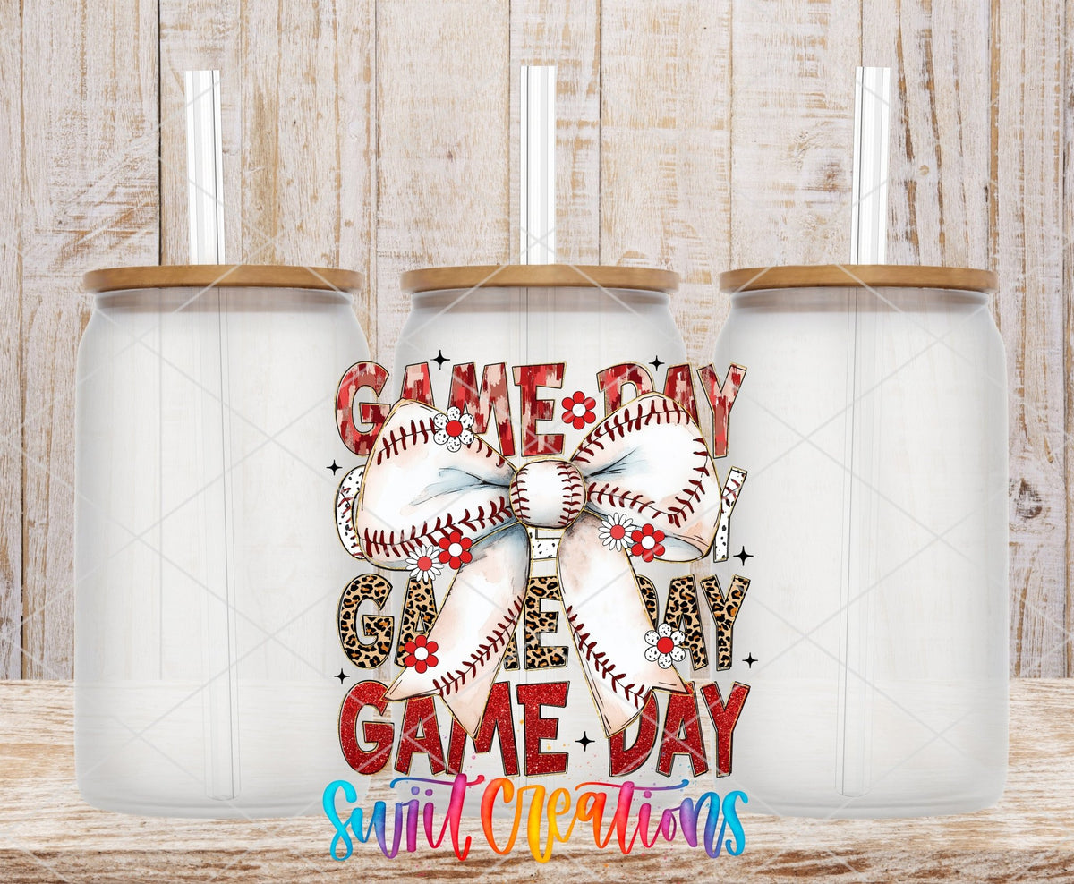 Game Day Baseball Croquette UV DTF transfer applied to a clear glass can set from Swiit Creations
