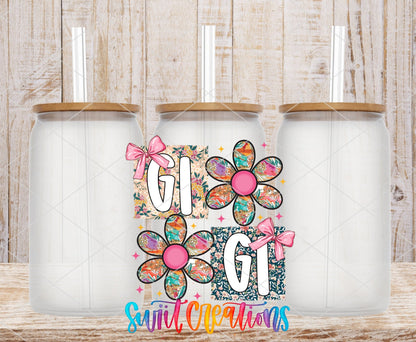 Gigi Floral Patchwork Daisy UV DTF transfer applied to a clear glass can set from Swiit Creations