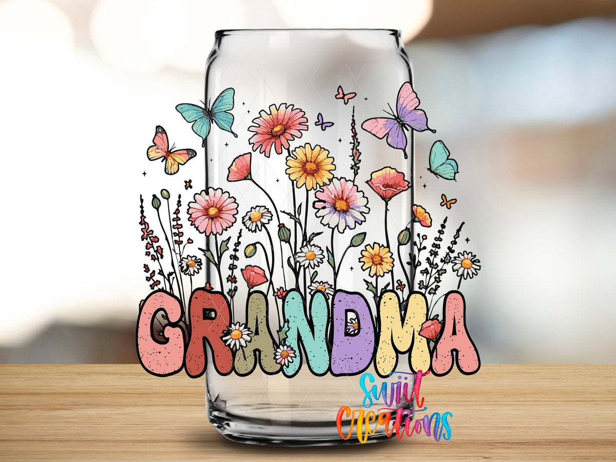 Grandma Floral Wildflower UV DTF transfer applied to a clear glass can from Swiit Creations