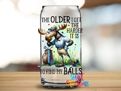The Older I Get Golf Moose design close-up on a clear glass can tumbler