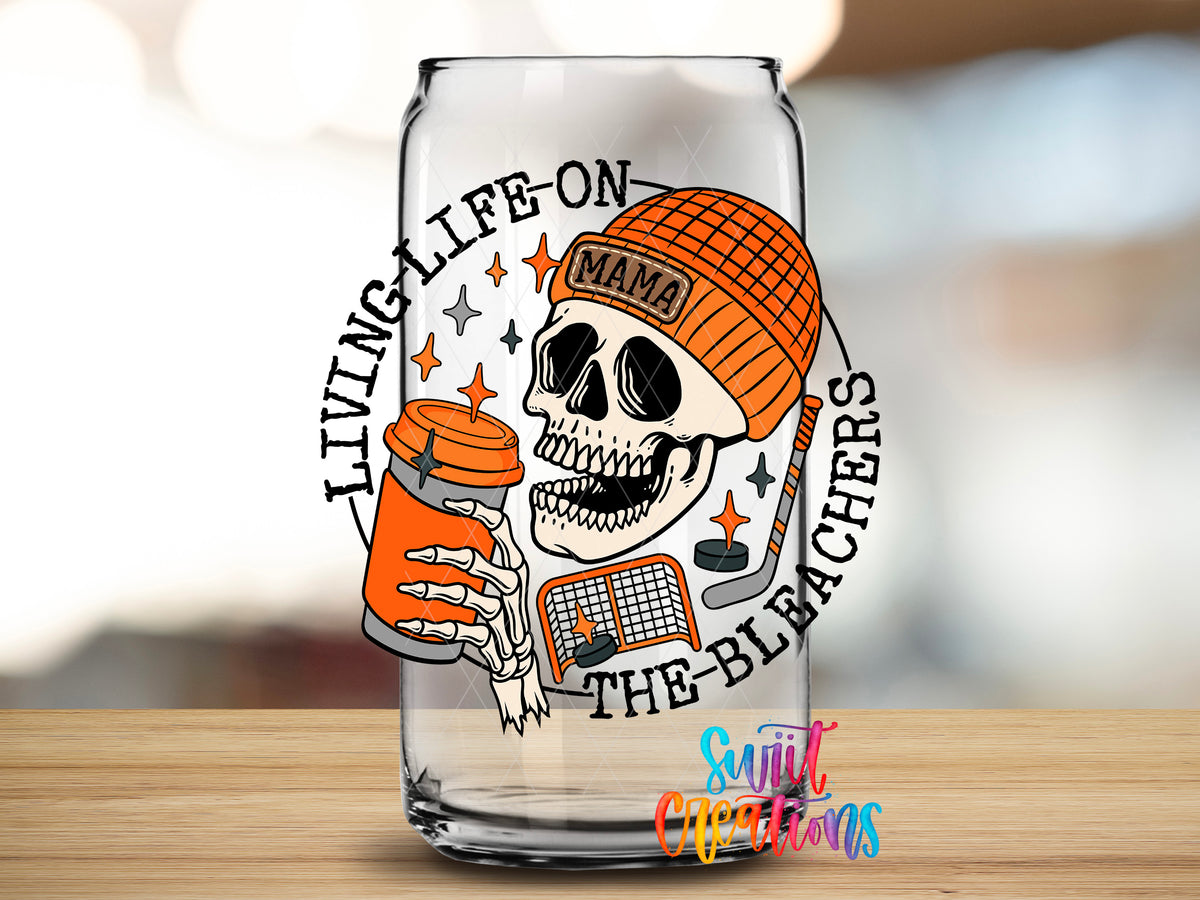 Hockey Mama Living Life on the Bleachers design close-up on a clear glass can tumbler