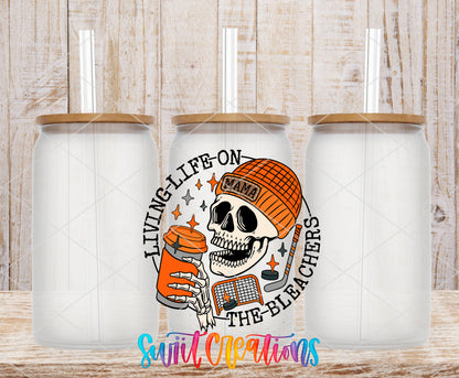 Hockey Mama Living Life on the Bleachers frosted glass tumbler mockup with bamboo lids and straws