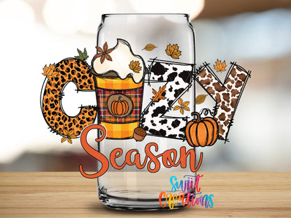 Cozy Season design close-up on a clear glass can tumbler