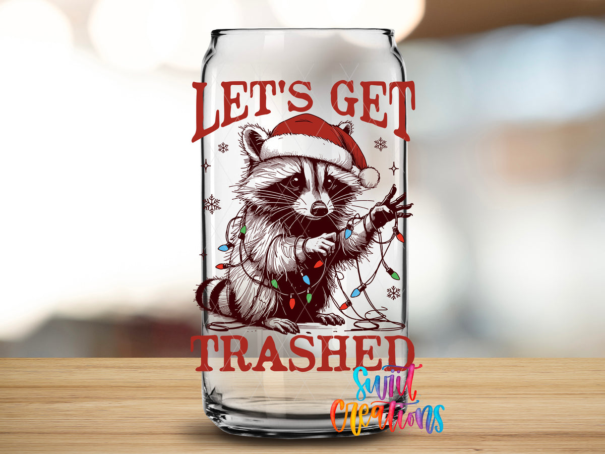 Let Us Get Trashed Christmas Raccoon design close-up on a clear glass can tumbler