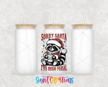Sorry Santa Feral Raccoon frosted glass tumbler group view with lids and straws